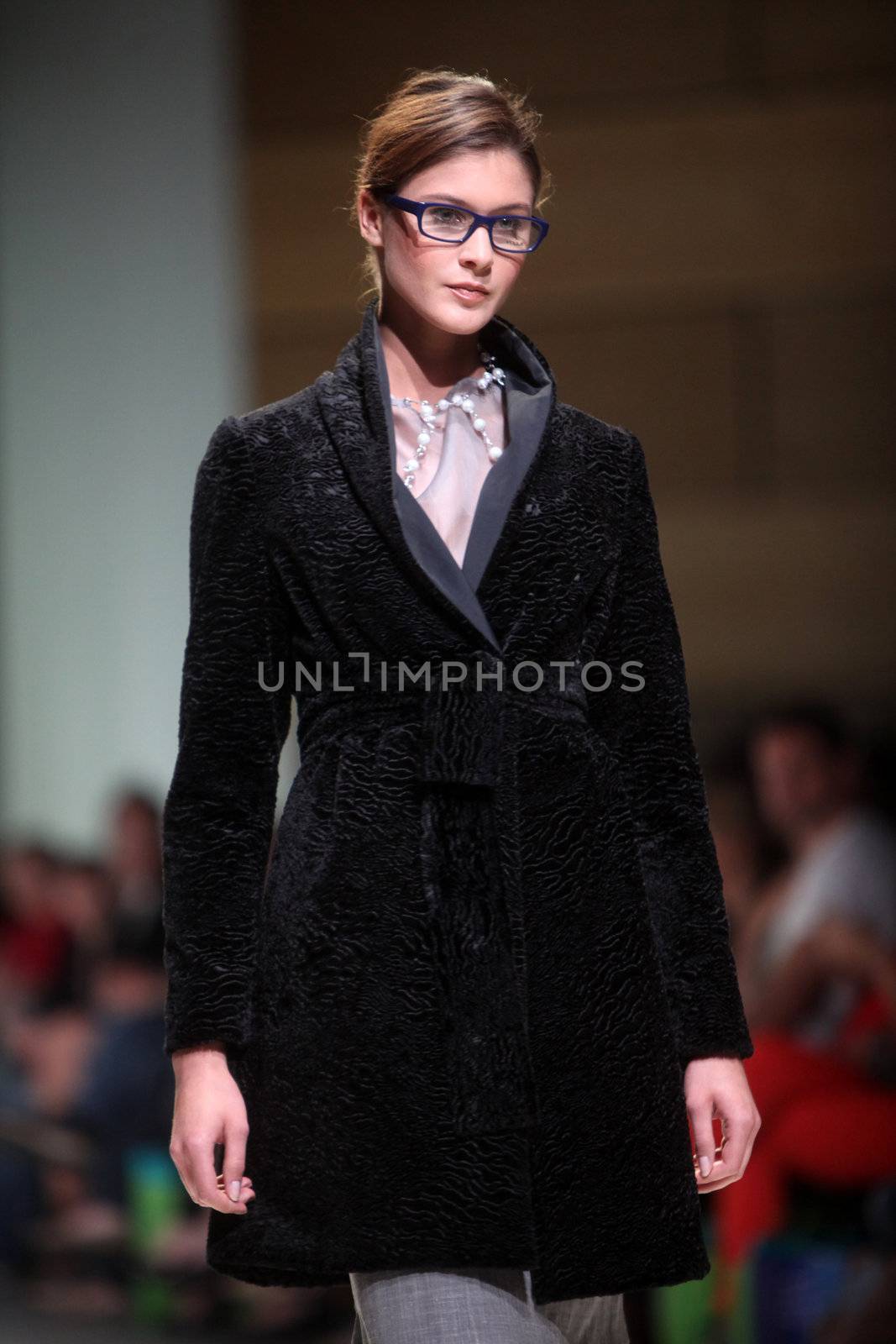 ZAGREB, CROATIA - May 10: Fashion model wears clothes made by Aba Tomicic Drvar on "ZAGREB FASHION WEEK" show on May 10, 2012 in Zagreb, Croatia.