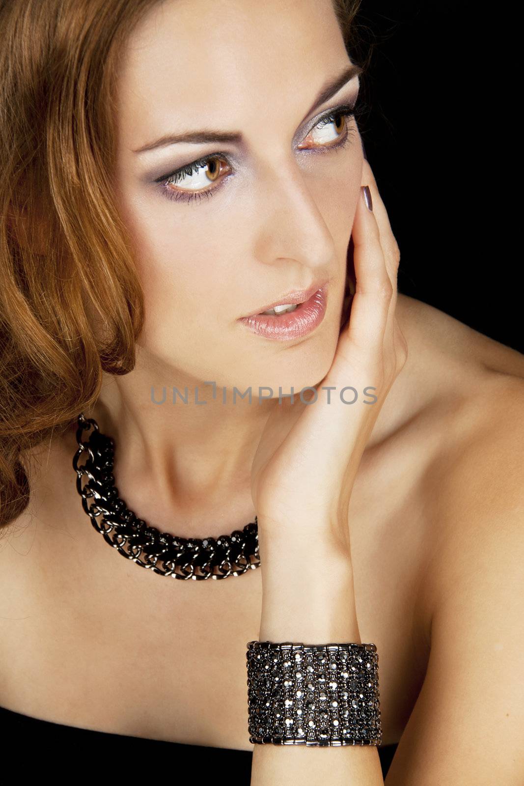 portrait of beautiful woman with elegance jewellery and glamour makeup