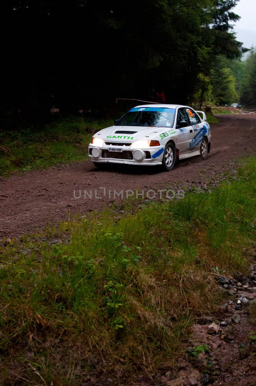MALLOW, IRELAND - MAY 19: D. Smith driving Mitsubishi Evo at the Jim Walsh Cork Forest Rally on May 19, 2012 in Mallow, Ireland. 4th round of the Valvoline National Forest Rally Championship.