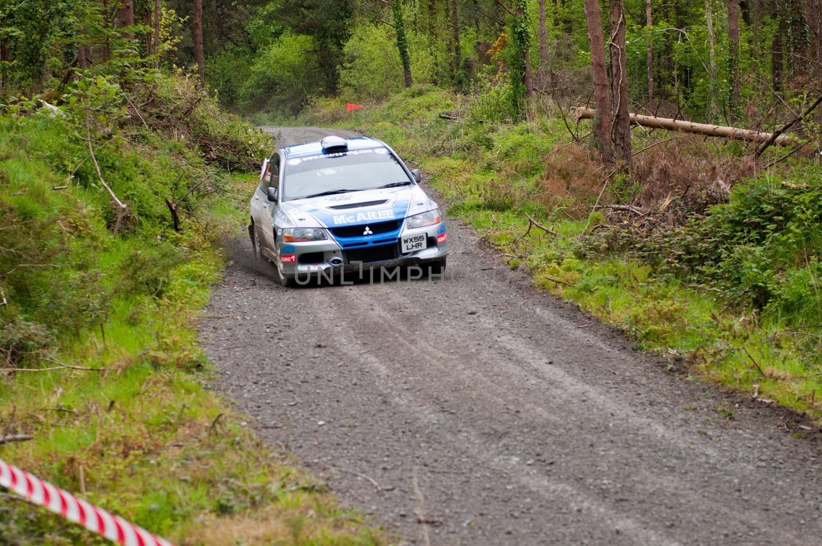 MALLOW, IRELAND - MAY 19: V. Mcaree driving Mitsubishi Evo at the Jim Walsh Cork Forest Rally on May 19, 2012 in Mallow, Ireland. 4th round of the Valvoline National Forest Rally Championship.