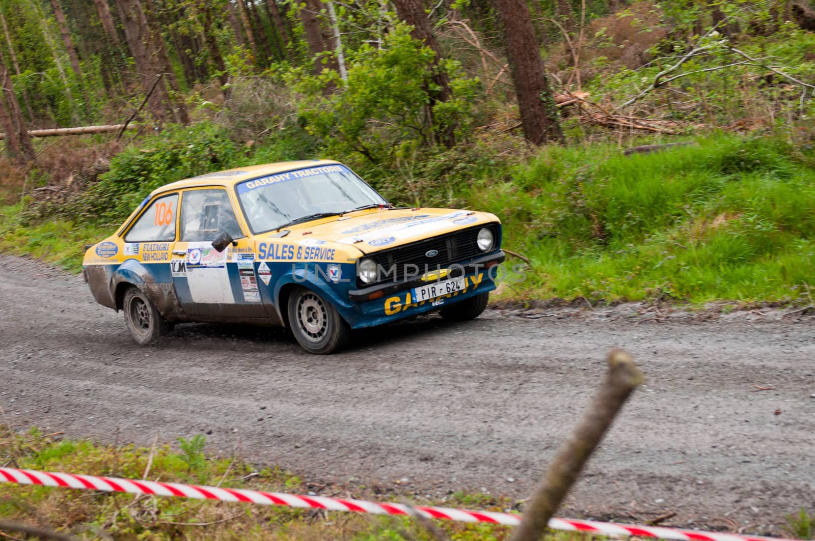 MALLOW, IRELAND - MAY 19: M. Nevin driving Ford Escort at the Jim Walsh Cork Forest Rally on May 19, 2012 in Mallow, Ireland. 4th round of the Valvoline National Forest Rally Championship.