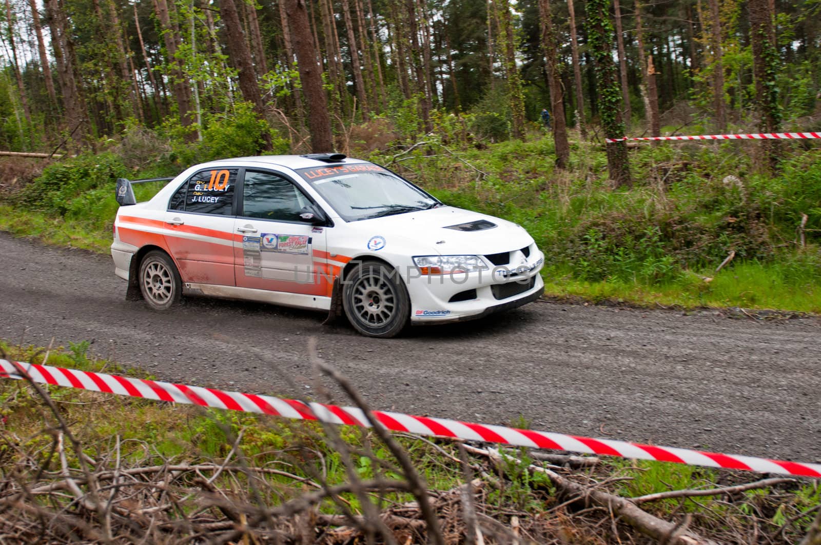 MALLOW, IRELAND - MAY 19: G. Lucey driving Mitsubishi Evo at the Jim Walsh Cork Forest Rally on May 19, 2012 in Mallow, Ireland. 4th round of the Valvoline National Forest Rally Championship.