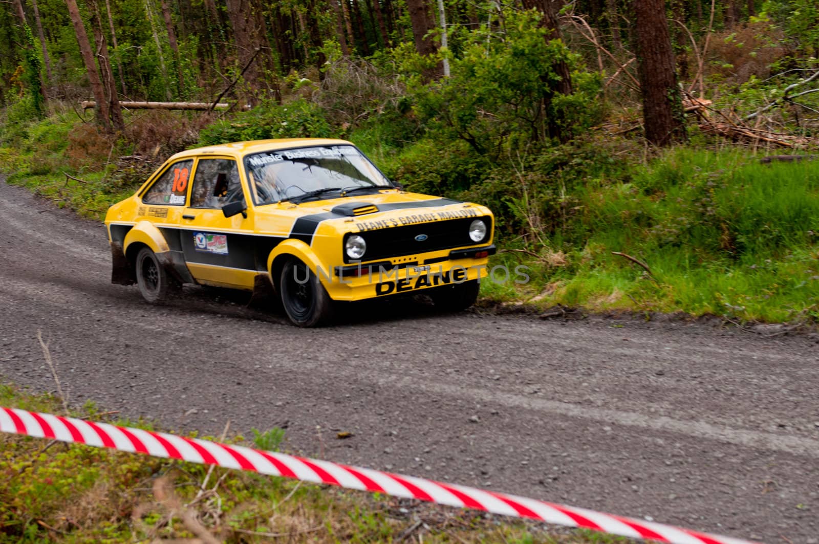 MALLOW, IRELAND - MAY 19: J. Deane driving Ford Escort at the Jim Walsh Cork Forest Rally on May 19, 2012 in Mallow, Ireland. 4th round of the Valvoline National Forest Rally Championship.