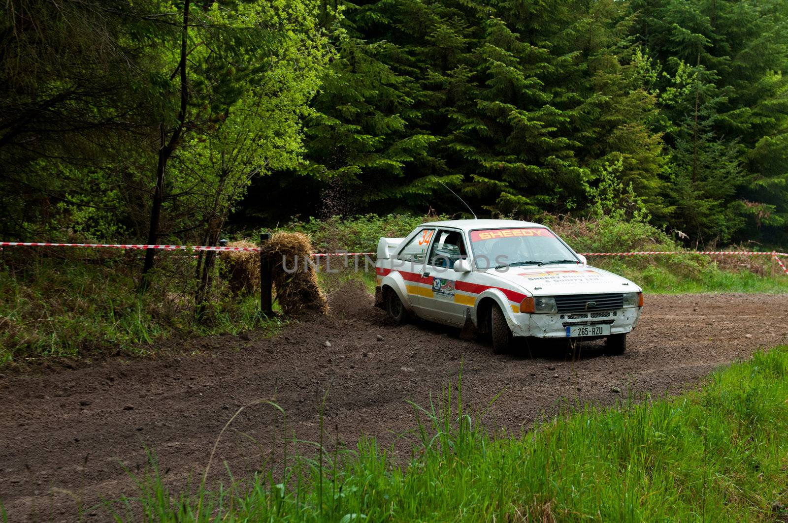 MALLOW, IRELAND - MAY 19: M. Sheedy driving Ford Escort at the Jim Walsh Cork Forest Rally on May 19, 2012 in Mallow, Ireland. 4th round of the Valvoline National Forest Rally Championship.