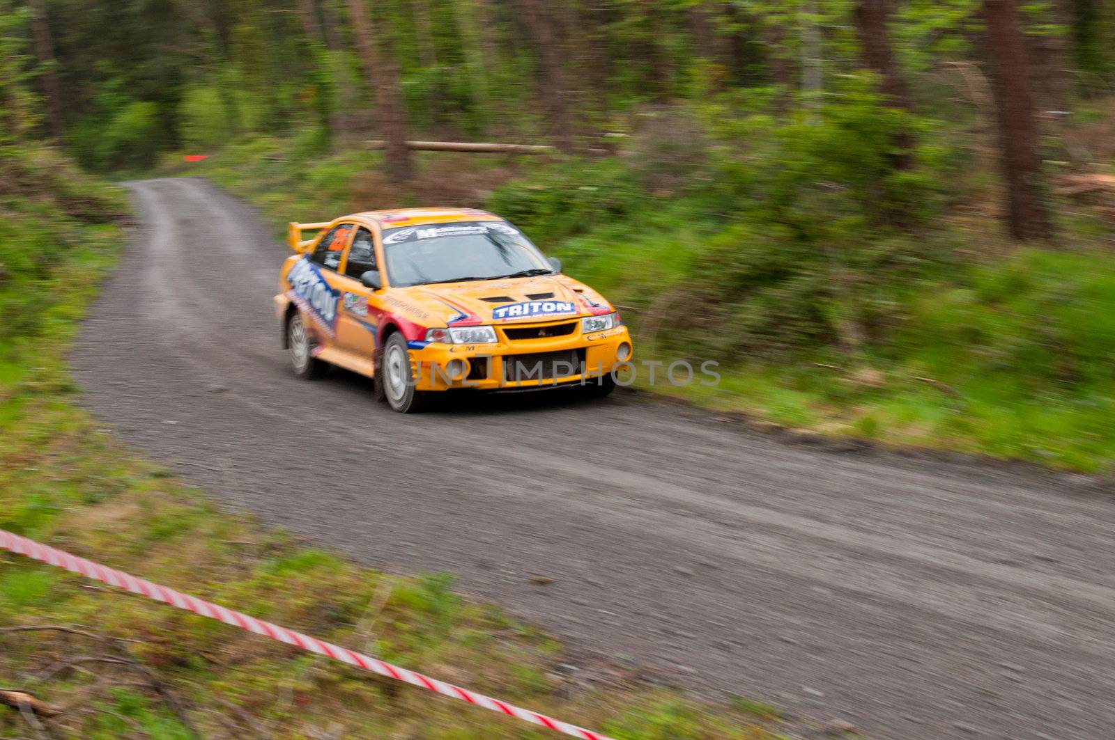 MALLOW, IRELAND - MAY 19: P. Barrett driving Mitsubishi Evo at the Jim Walsh Cork Forest Rally on May 19, 2012 in Mallow, Ireland. 4th round of the Valvoline National Forest Rally Championship.