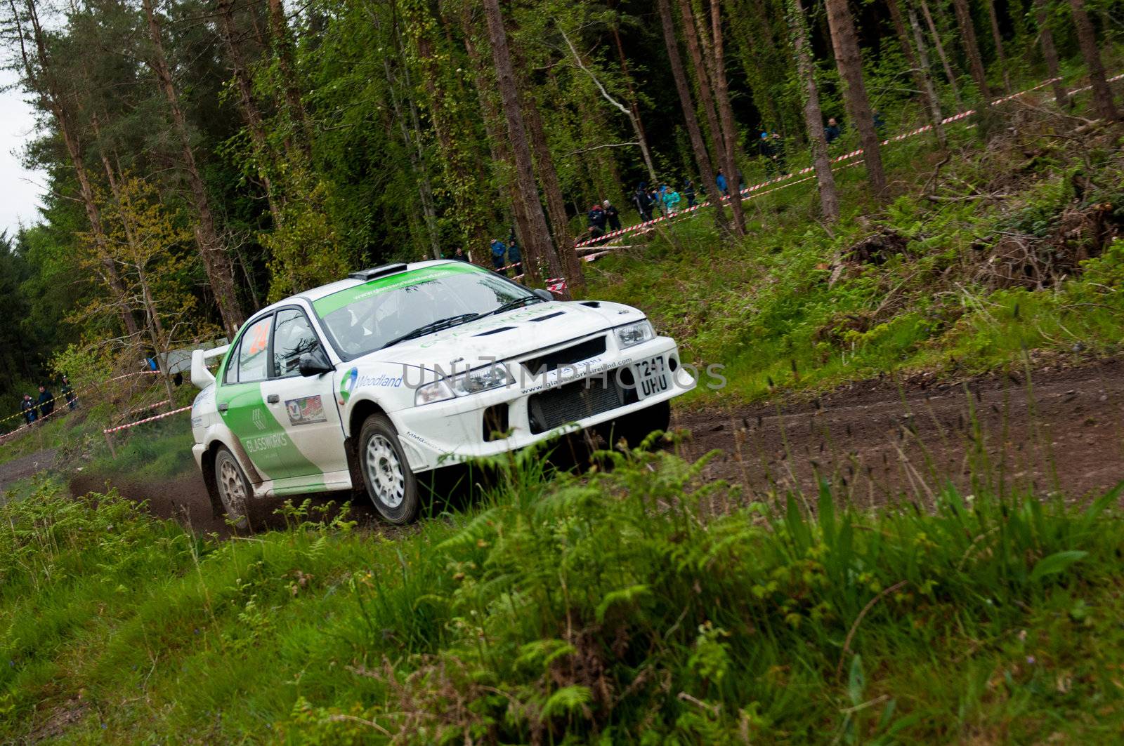 MALLOW, IRELAND - MAY 19: J. Laverty driving Mitsubishi Evo at the Jim Walsh Cork Forest Rally on May 19, 2012 in Mallow, Ireland. 4th round of the Valvoline National Forest Rally Championship.