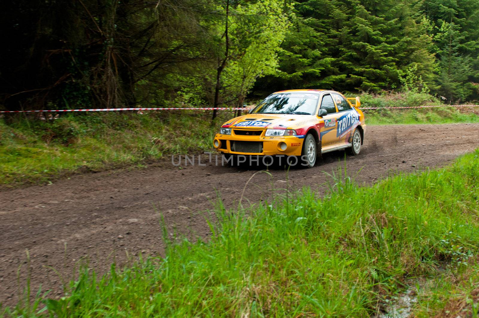 MALLOW, IRELAND - MAY 19: P. Barrett driving Mitsubishi Evo at the Jim Walsh Cork Forest Rally on May 19, 2012 in Mallow, Ireland. 4th round of the Valvoline National Forest Rally Championship.
