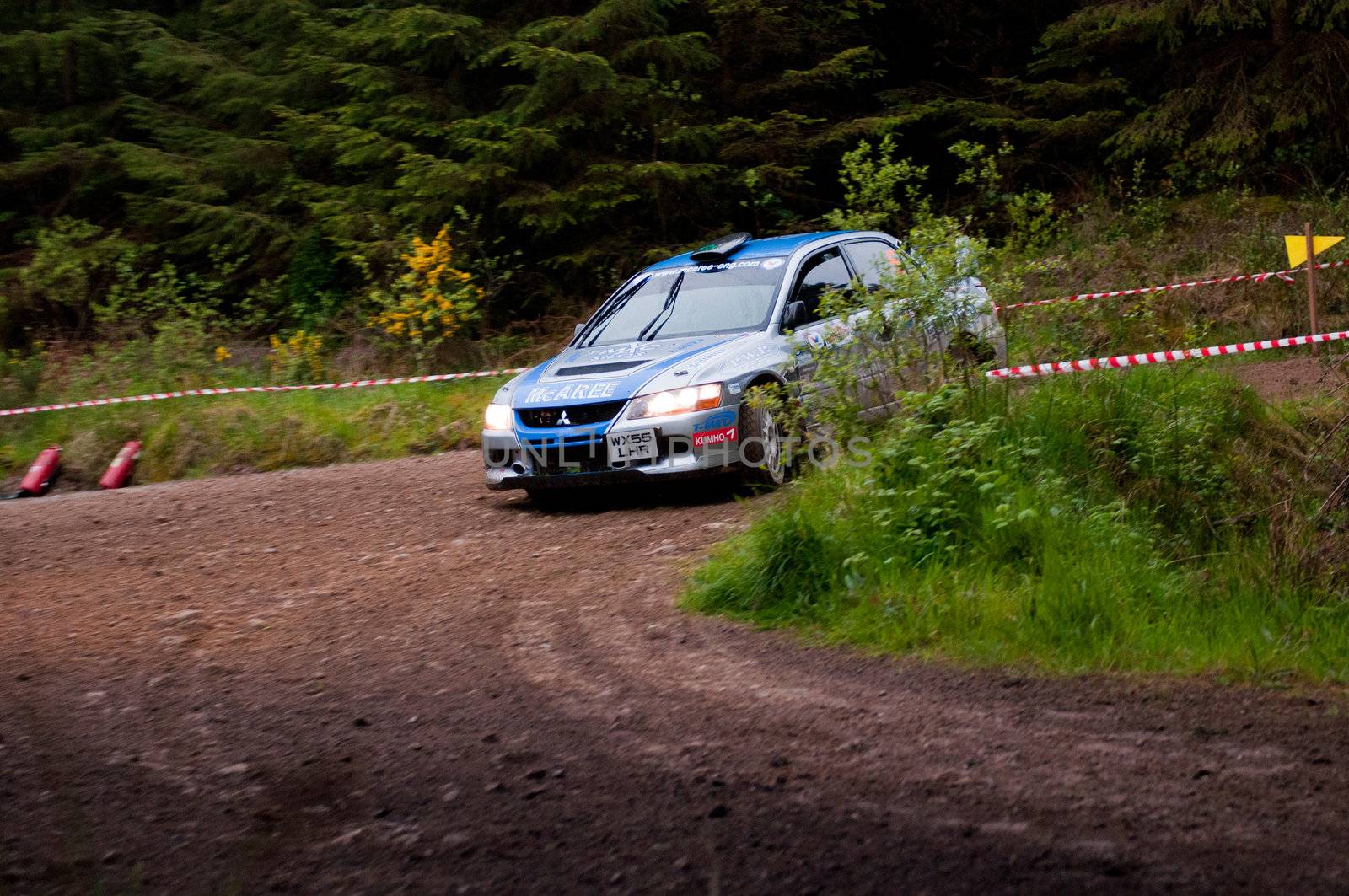 MALLOW, IRELAND - MAY 19: V. Mcaree driving Mitsubishi Evo at the Jim Walsh Cork Forest Rally on May 19, 2012 in Mallow, Ireland. 4th round of the Valvoline National Forest Rally Championship.