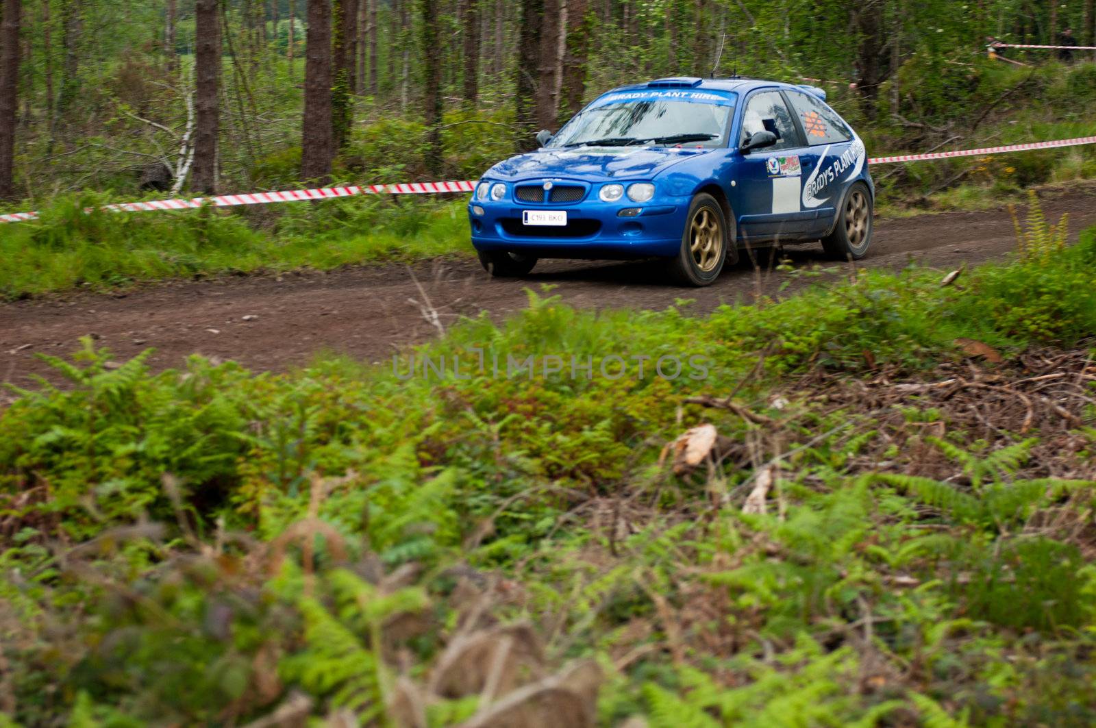 MALLOW, IRELAND - MAY 19: M. Brady driving Rover MG at the Jim Walsh Cork Forest Rally on May 19, 2012 in Mallow, Ireland. 4th round of the Valvoline National Forest Rally Championship.