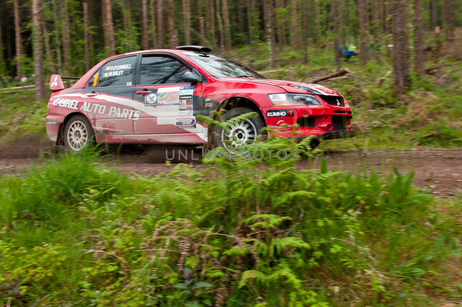 MALLOW, IRELAND - MAY 19: P. O' Connell driving Mitsubishi Evo at the Jim Walsh Cork Forest Rally on May 19, 2012 in Mallow, Ireland. 4th round of the Valvoline National Forest Rally Championship.