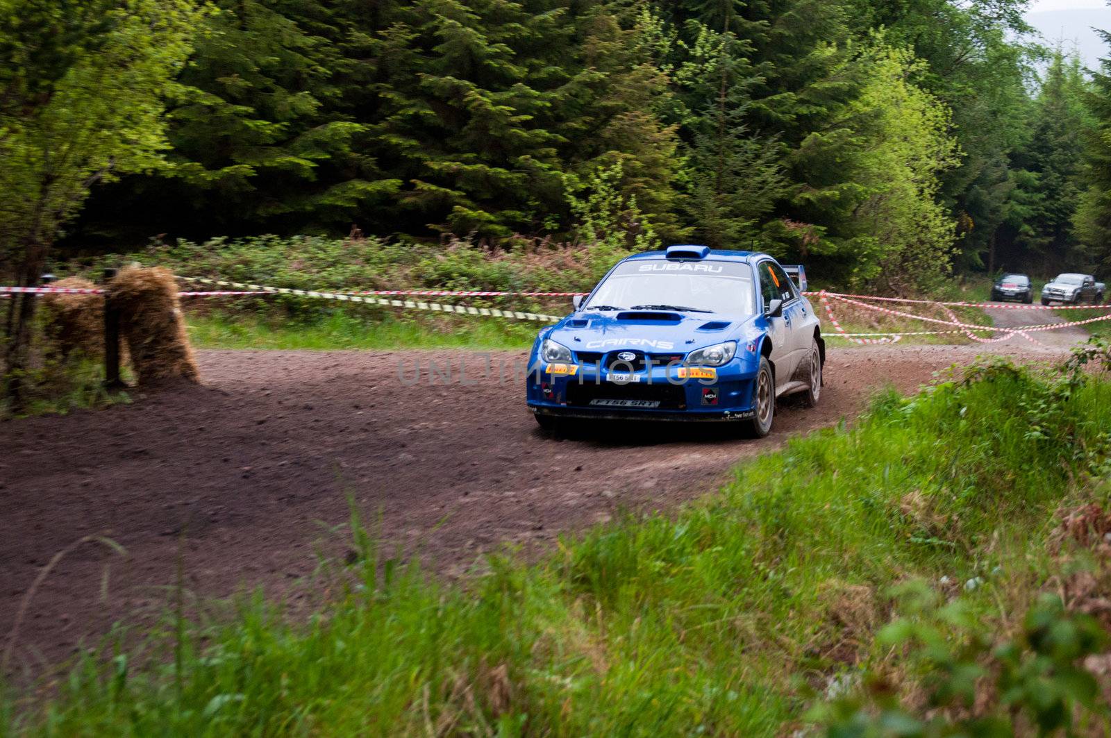 MALLOW, IRELAND - MAY 19: M. Cairns driving Subaru Impreza at the Jim Walsh Cork Forest Rally on May 19, 2012 in Mallow, Ireland. 4th round of the Valvoline National Forest Rally Championship.