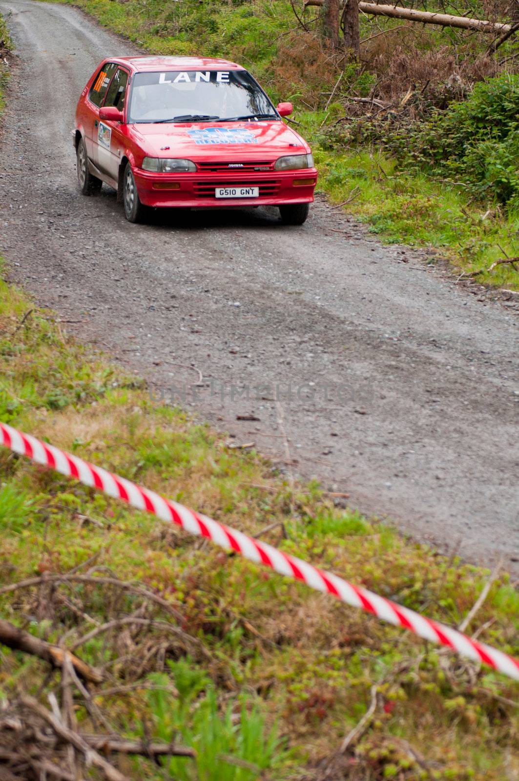 MALLOW, IRELAND - MAY 19: S. Lane driving Toyota Corolla at the Jim Walsh Cork Forest Rally on May 19, 2012 in Mallow, Ireland. 4th round of the Valvoline National Forest Rally Championship.