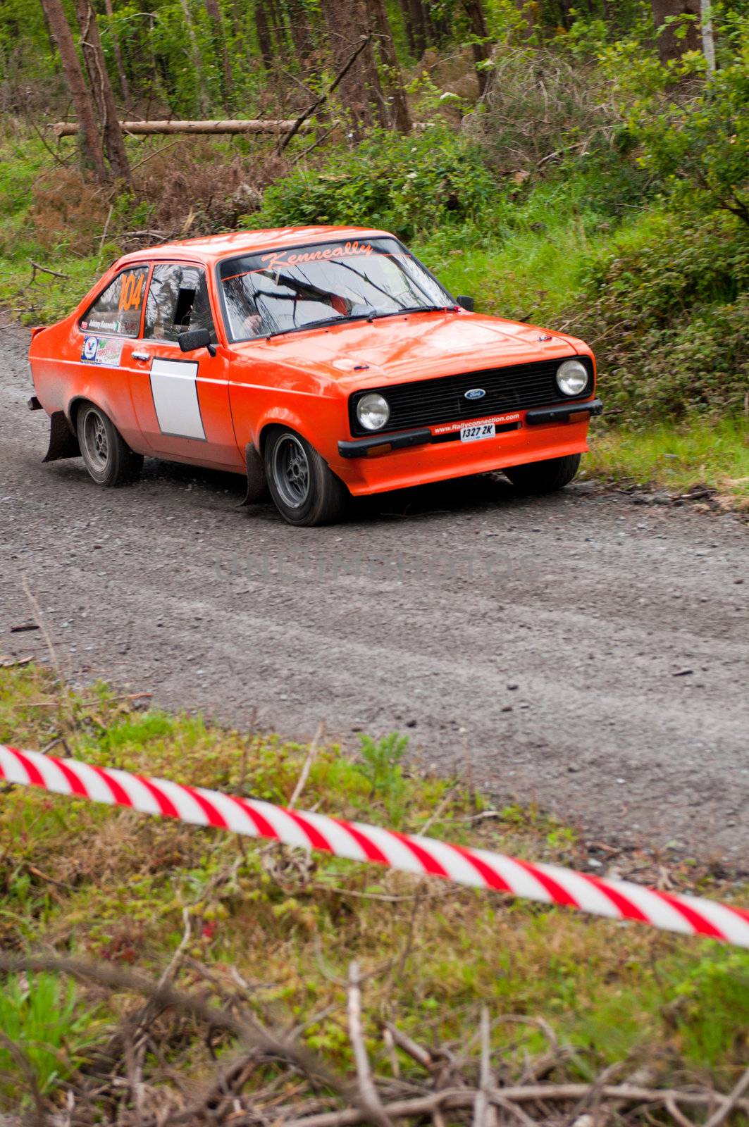 MALLOW, IRELAND - MAY 19: J. Kenneally driving Ford Escort at the Jim Walsh Cork Forest Rally on May 19, 2012 in Mallow, Ireland. 4th round of the Valvoline National Forest Rally Championship.