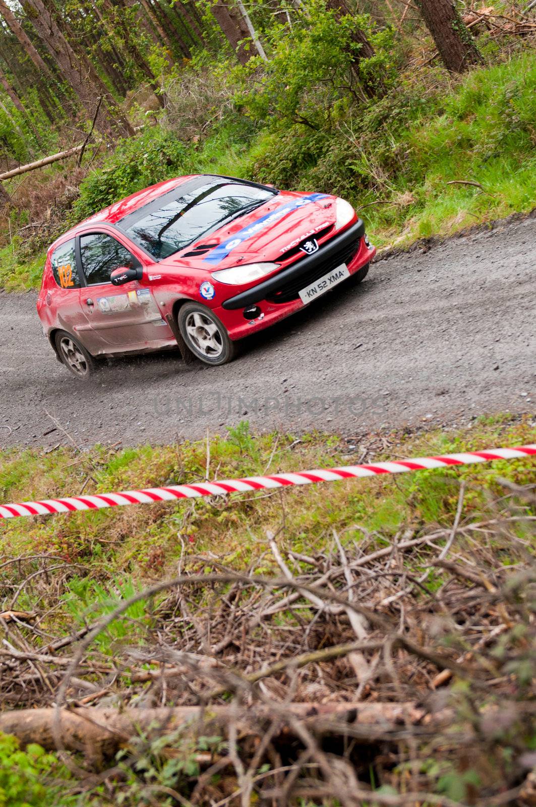 MALLOW, IRELAND - MAY 19: D. Cronin driving Peugeot 206 at the Jim Walsh Cork Forest Rally on May 19, 2012 in Mallow, Ireland. 4th round of the Valvoline National Forest Rally Championship.