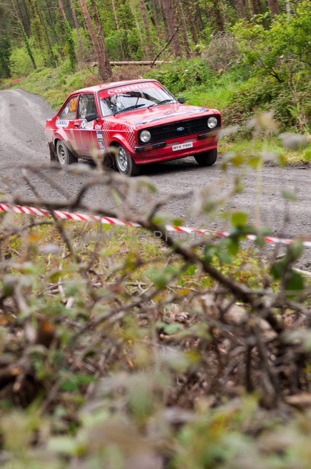 MALLOW, IRELAND - MAY 19: A. Commins driving Ford Escort at the Jim Walsh Cork Forest Rally on May 19, 2012 in Mallow, Ireland. 4th round of the Valvoline National Forest Rally Championship.