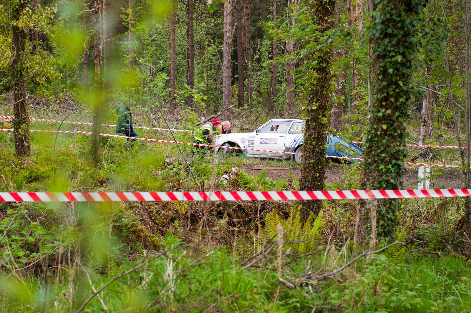 MALLOW, IRELAND - MAY 19: S. Benskin off road on Ford Escort at the Jim Walsh Cork Forest Rally on May 19, 2012 in Mallow, Ireland. 4th round of the Valvoline National Forest Rally Championship.