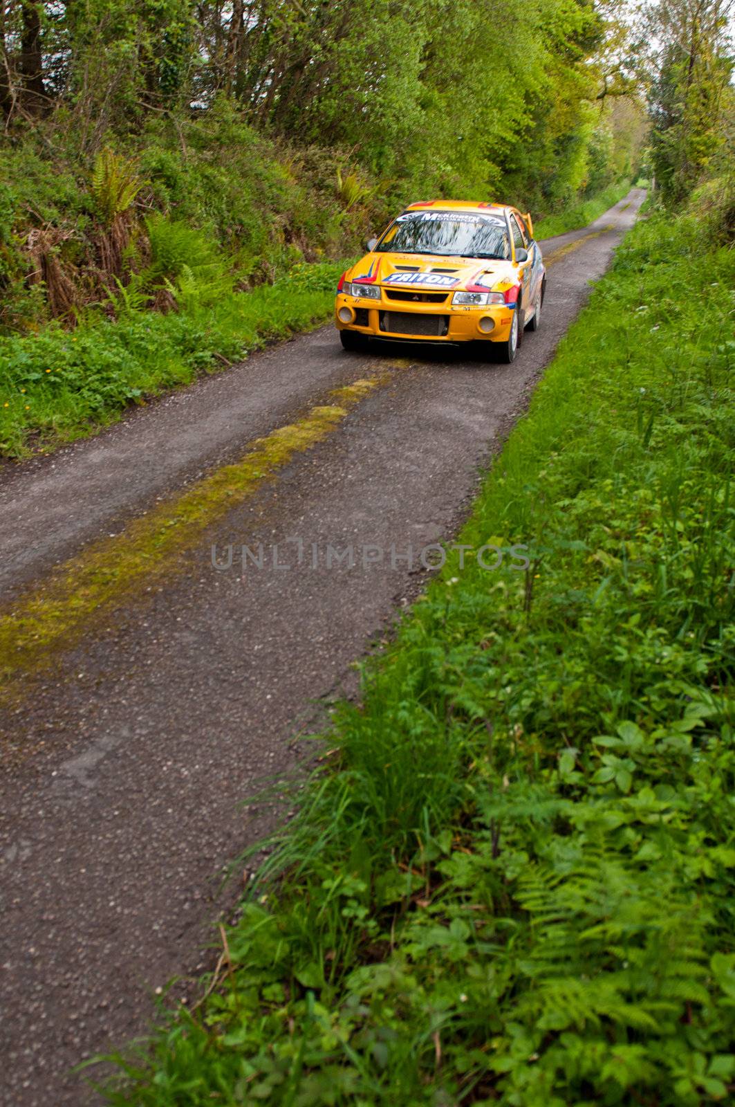 MALLOW, IRELAND - MAY 19: P. Barrett driving Mitsubishi Evo at the Jim Walsh Cork Forest Rally on May 19, 2012 in Mallow, Ireland. 4th round of the Valvoline National Forest Rally Championship.