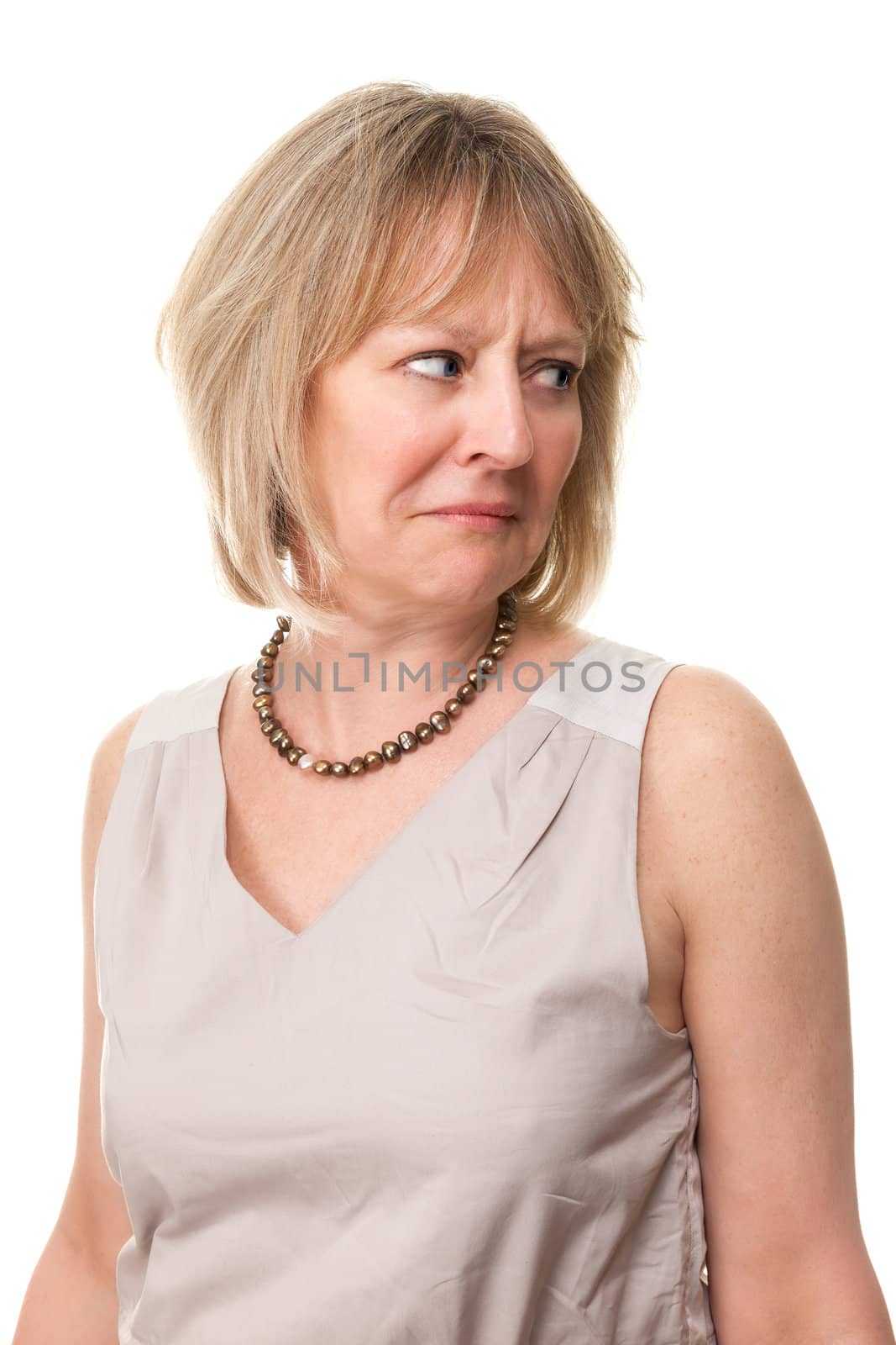 Attractive Mature Woman Looking Over Shoulder with Worried Expression Isolated