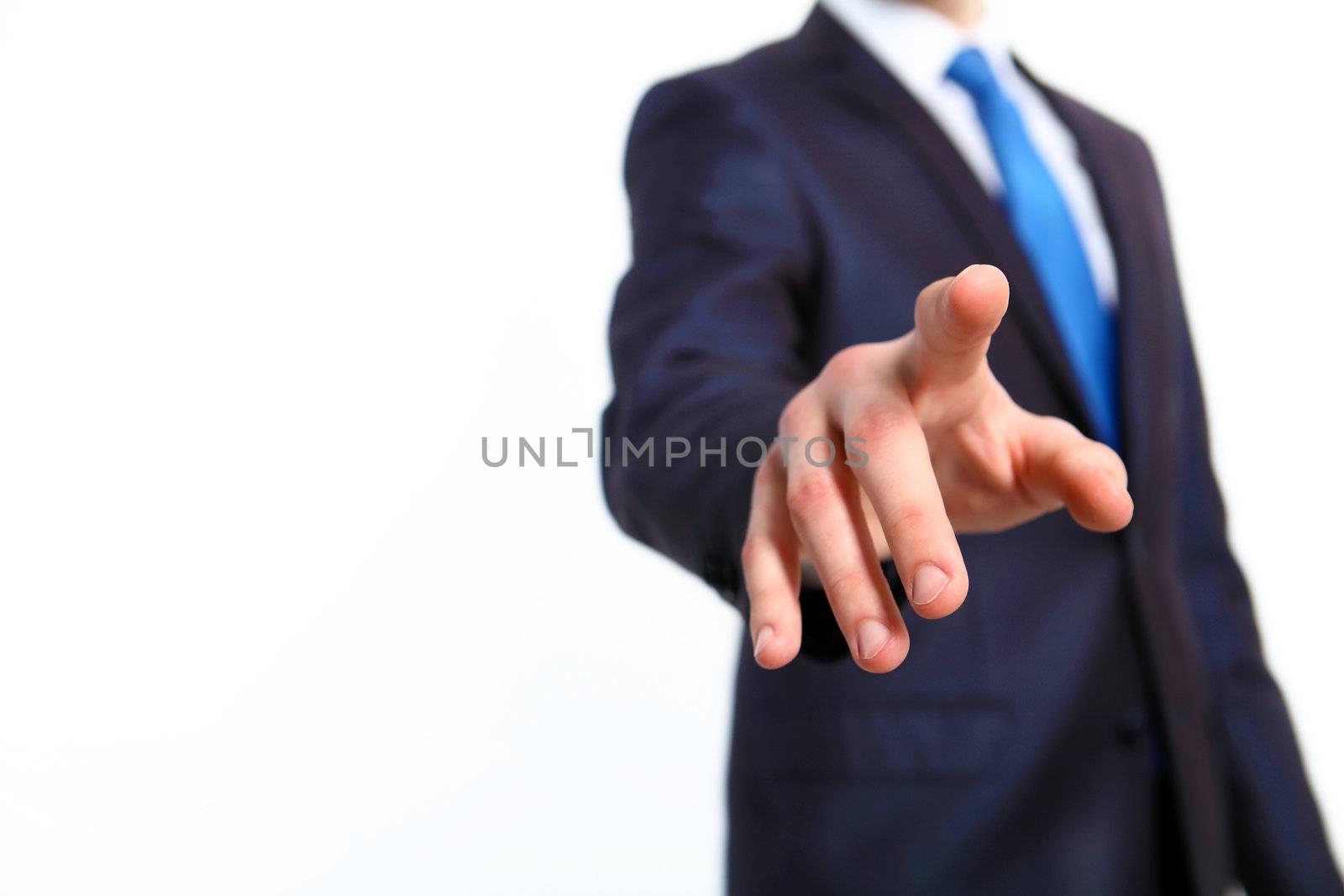 Business man in suit pushing a button with his finger