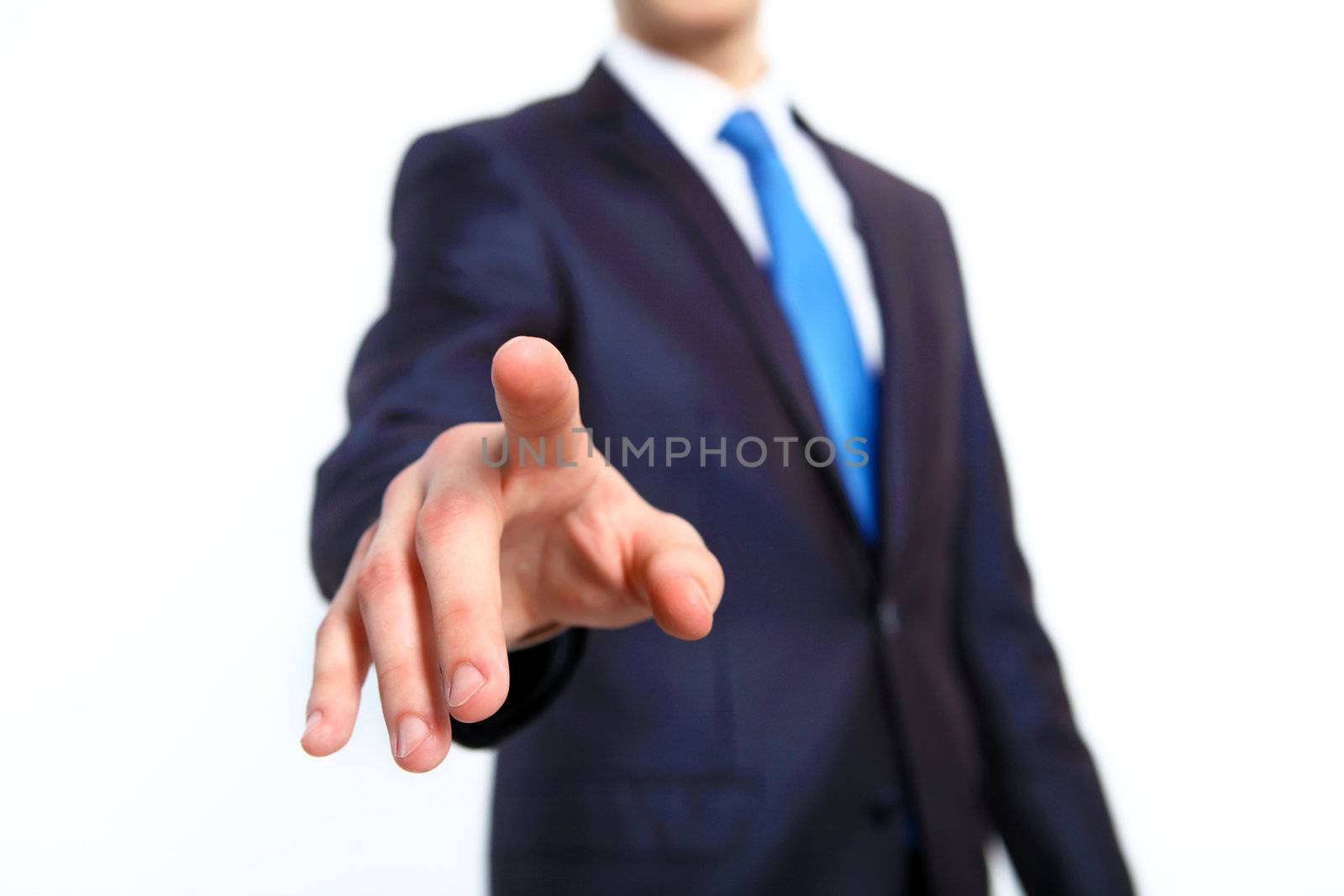 Business man in suit pushing a button with his finger