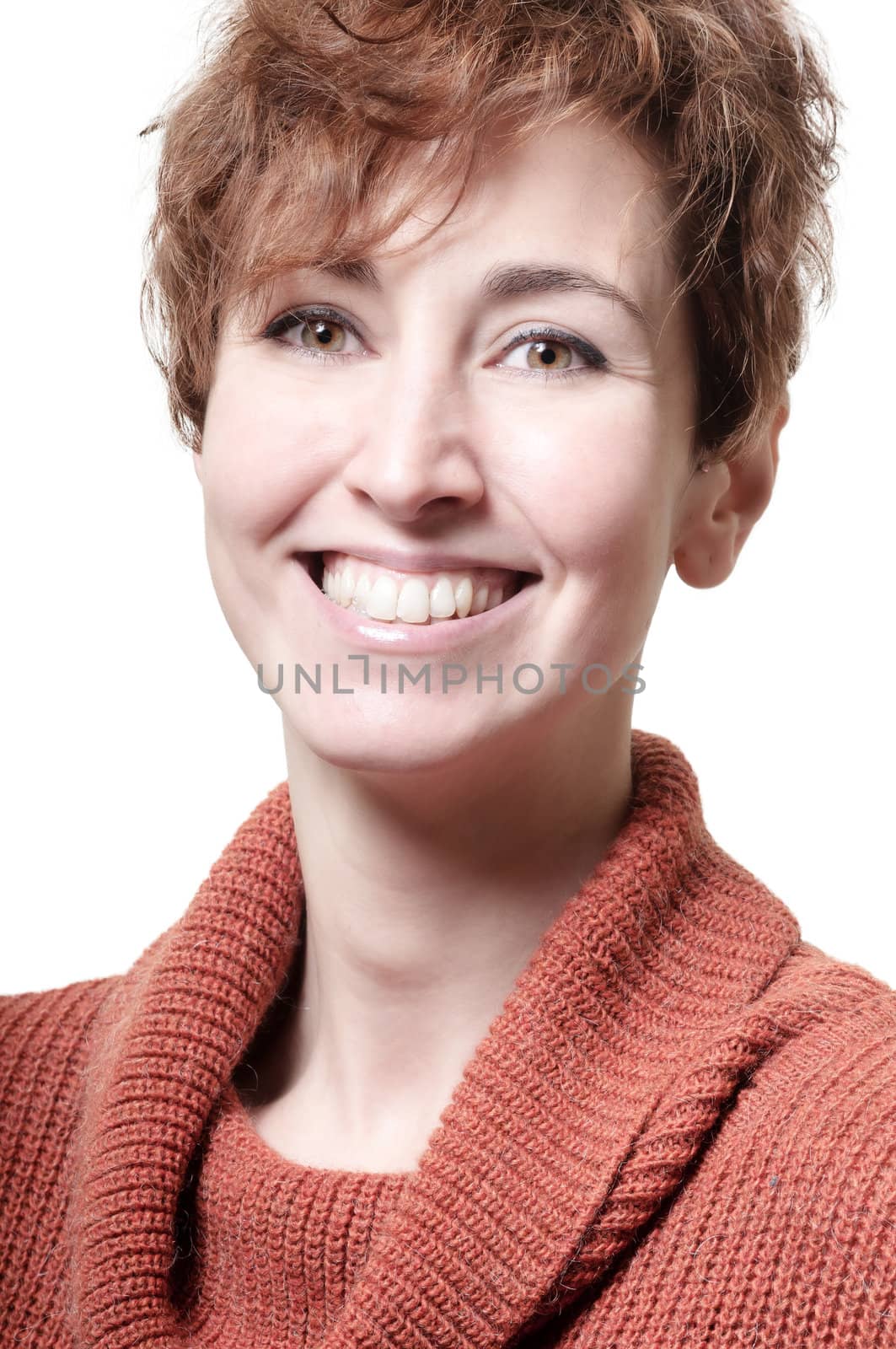 smiling short hair girl cold with orange sweater on white background