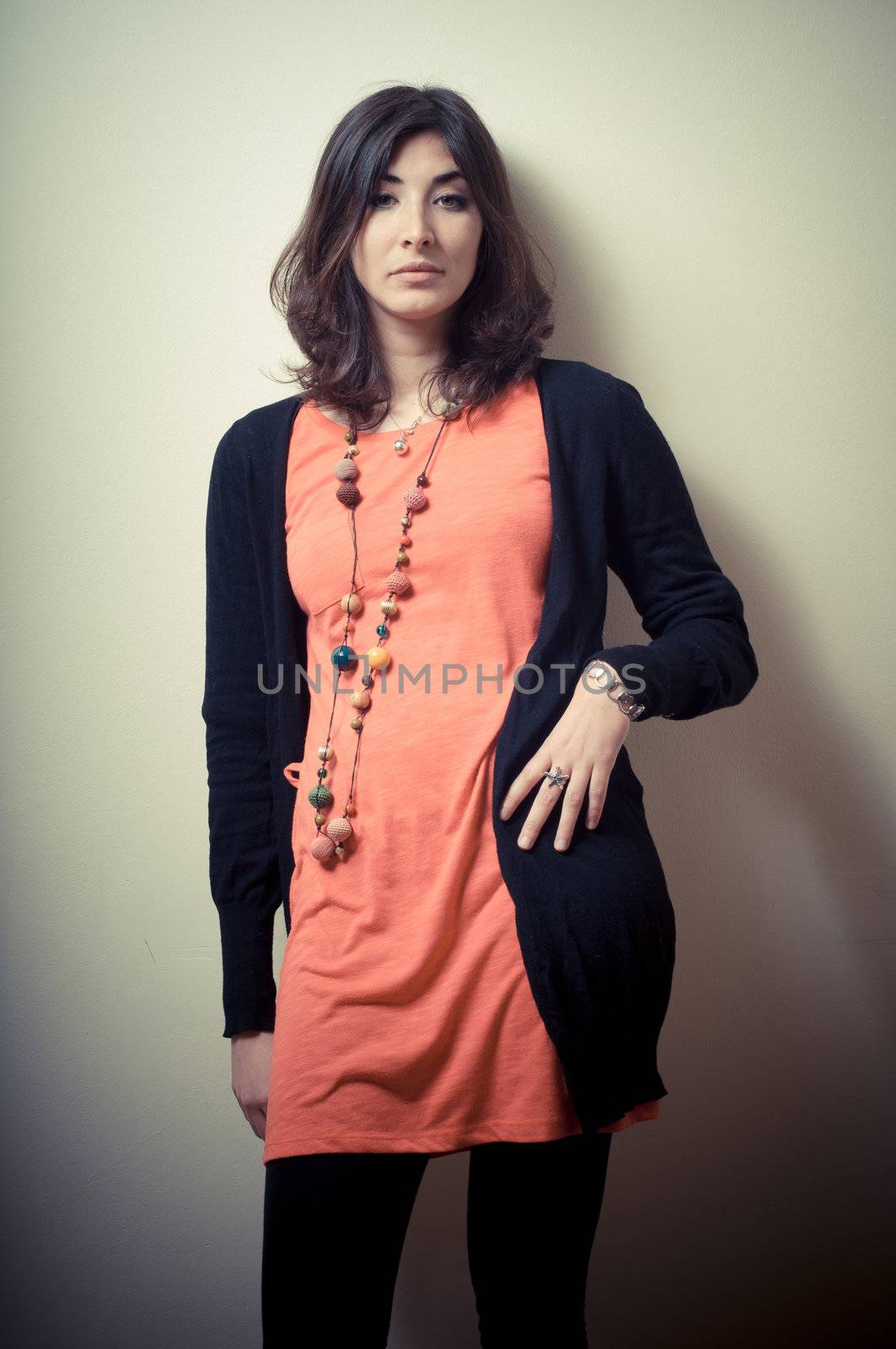 beautiful fashion hipster girl on gray background