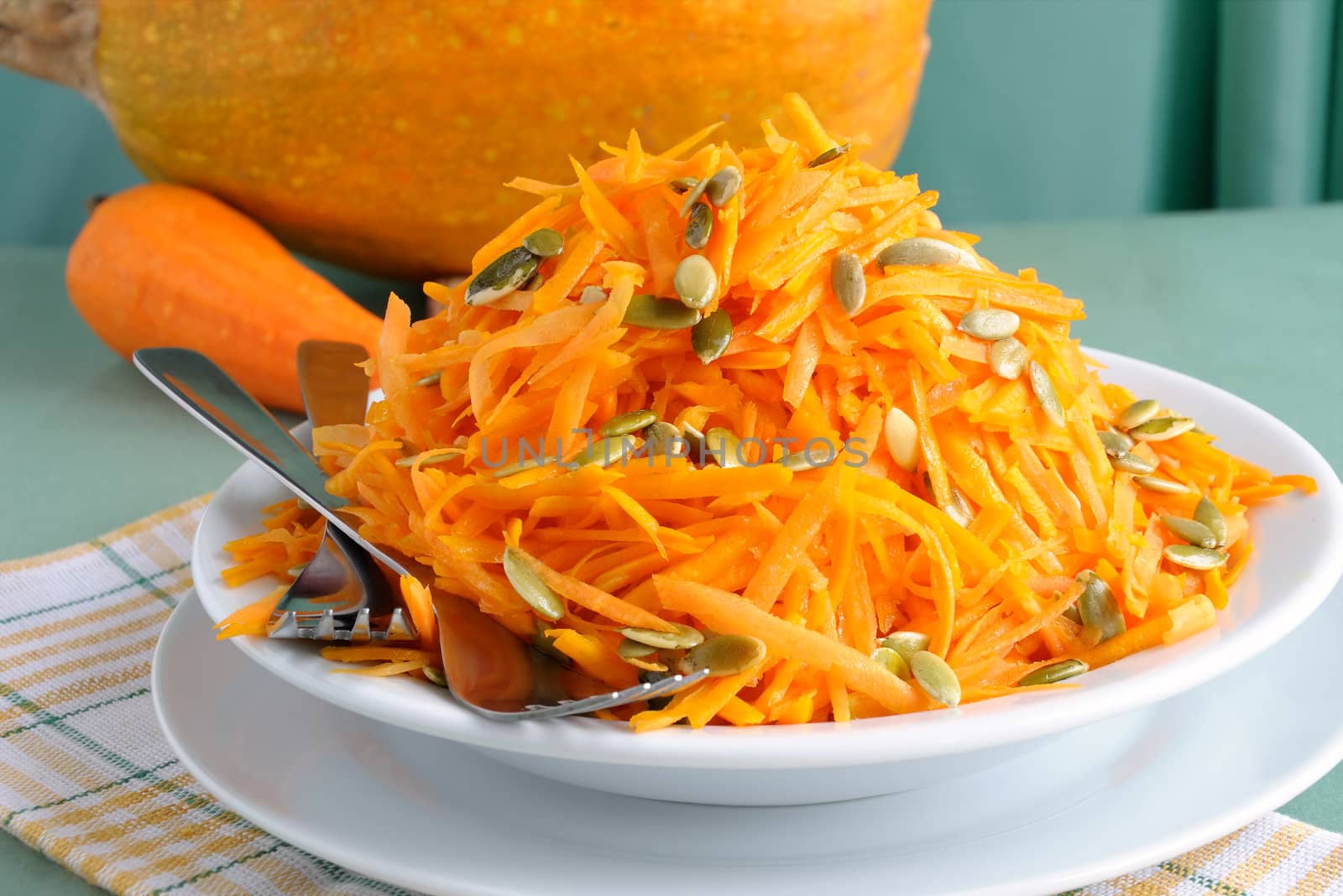 Salad of pumpkin and carrot with pumpkin seeds by Apolonia