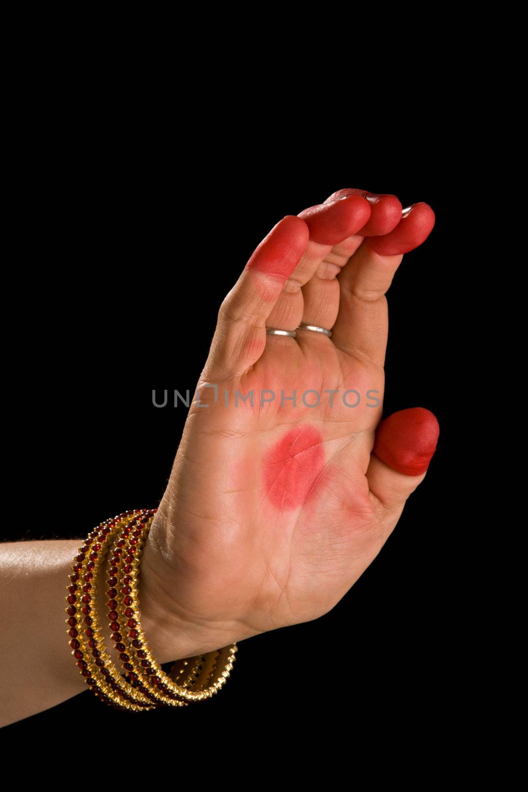 Woman hand showing Sarpashira hasta (hand gesture, also called mudra) (meaning "Snake hood") of indian classic dance Bharata Natyam. Also used in Indian dances Odissi and Kuchipudi.