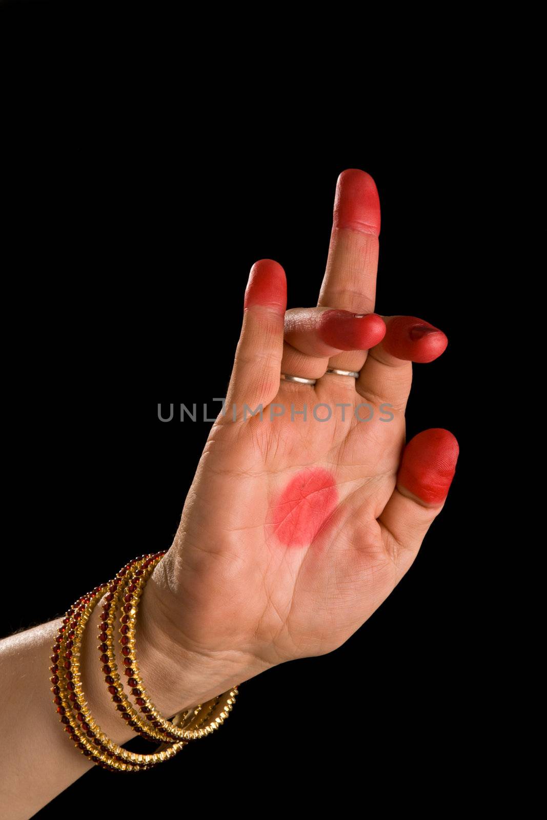 Woman hand showing Schukatunda hasta  (hand gesture, also called mudra)(meaning "Parrot's head") of indian classic dance Bharata Natyam. Also used in Indian dances Odissi and Kuchipudi.