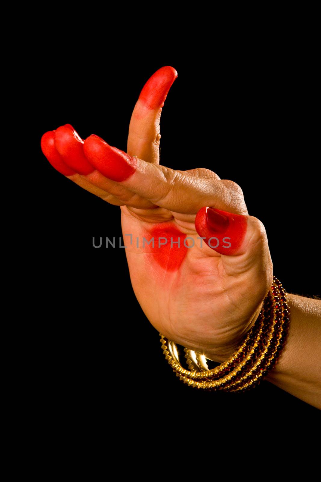Woman hand showing Hamsapaksha hasta (hand gesture, also called mudra) (meaning "number 6" or "Bridge") of indian classic dance Bharata Natyam. Also used in other indian classical dances Kuchipudi and Odissi.