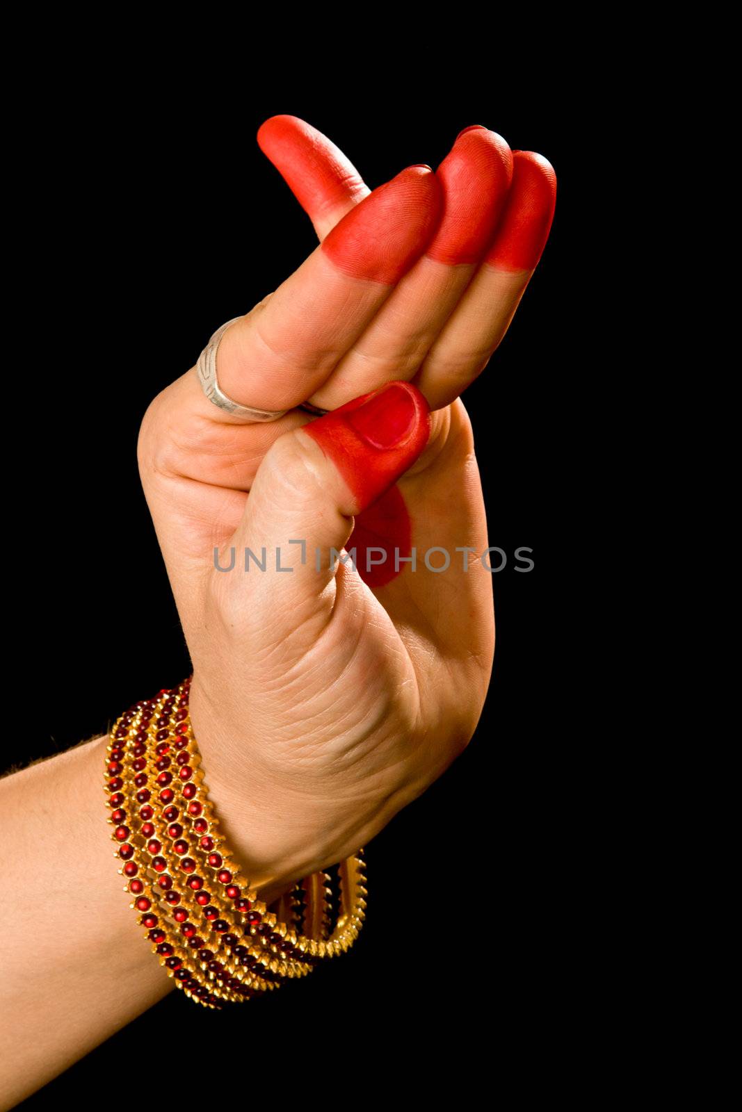 Woman hand showing Chatura hasta  (hand gesture, also called mudra) (meaning "Square") of indian classic dance Bharata Natyam. Also used in other indian classical dances Kuchipudi and Odissi.