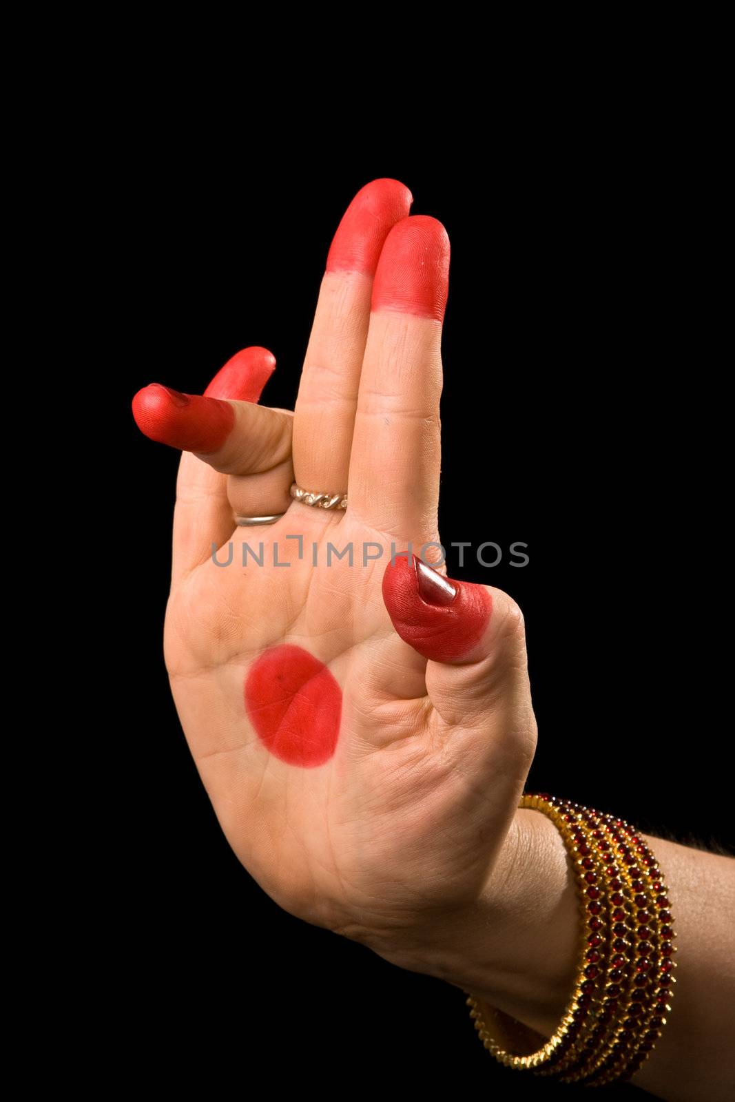 Woman hand showing Tripataka hasta (meaning three-cornered flag) of indian classic dance Bharata Natyam