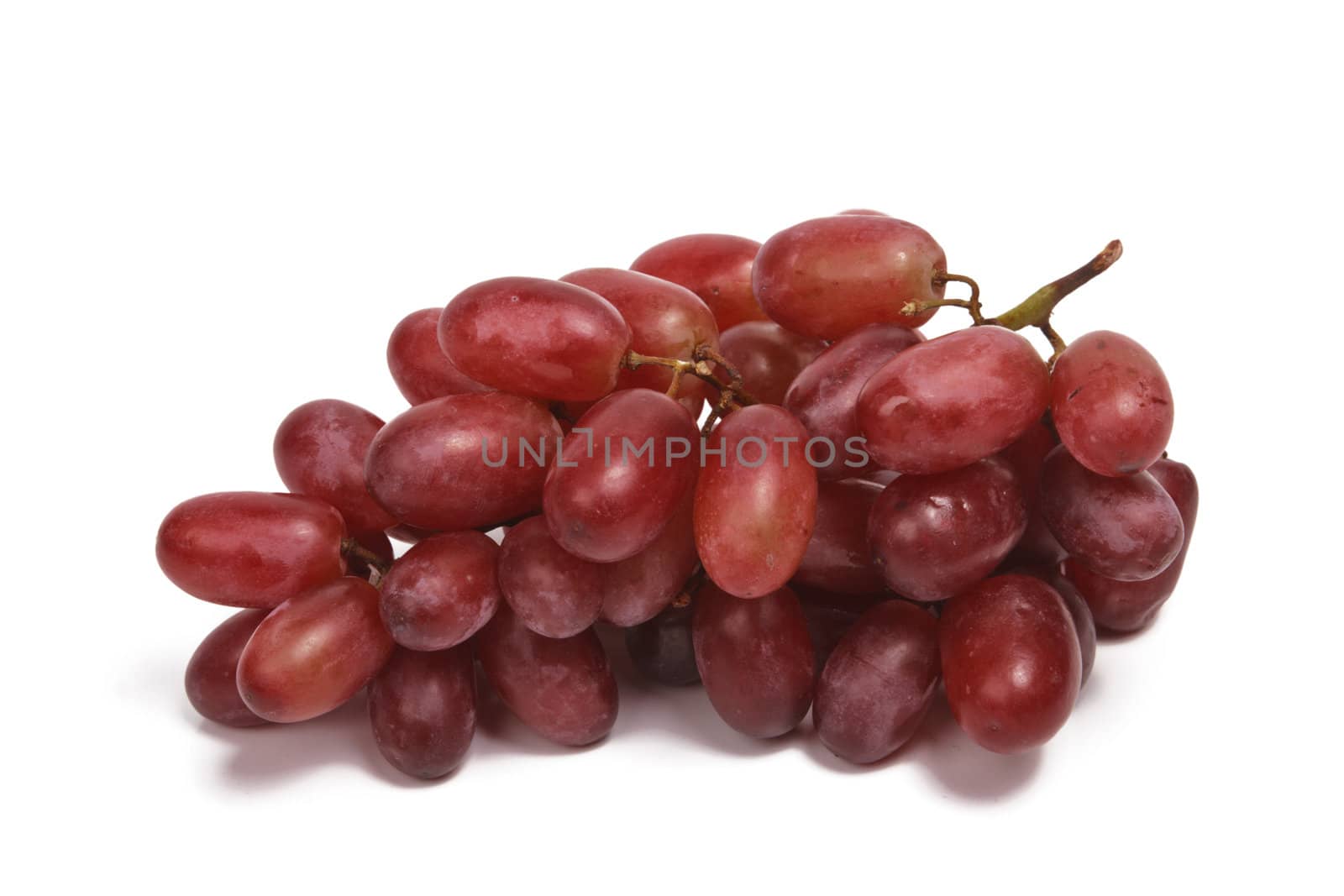 Bunch of red grapes isolated on white background