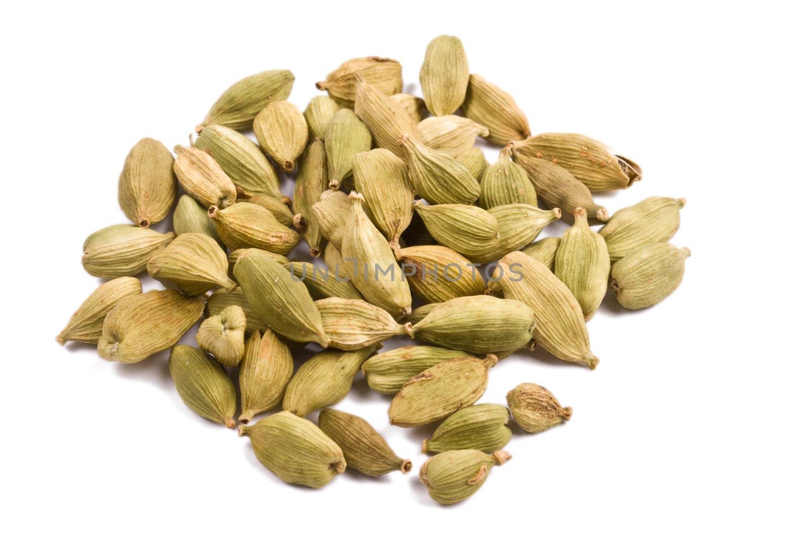 Pile of cardamom isolated on white background close up