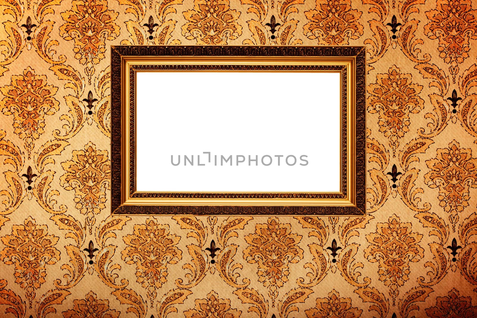 Vintage gold plated picture frame  on retro wallpaper background