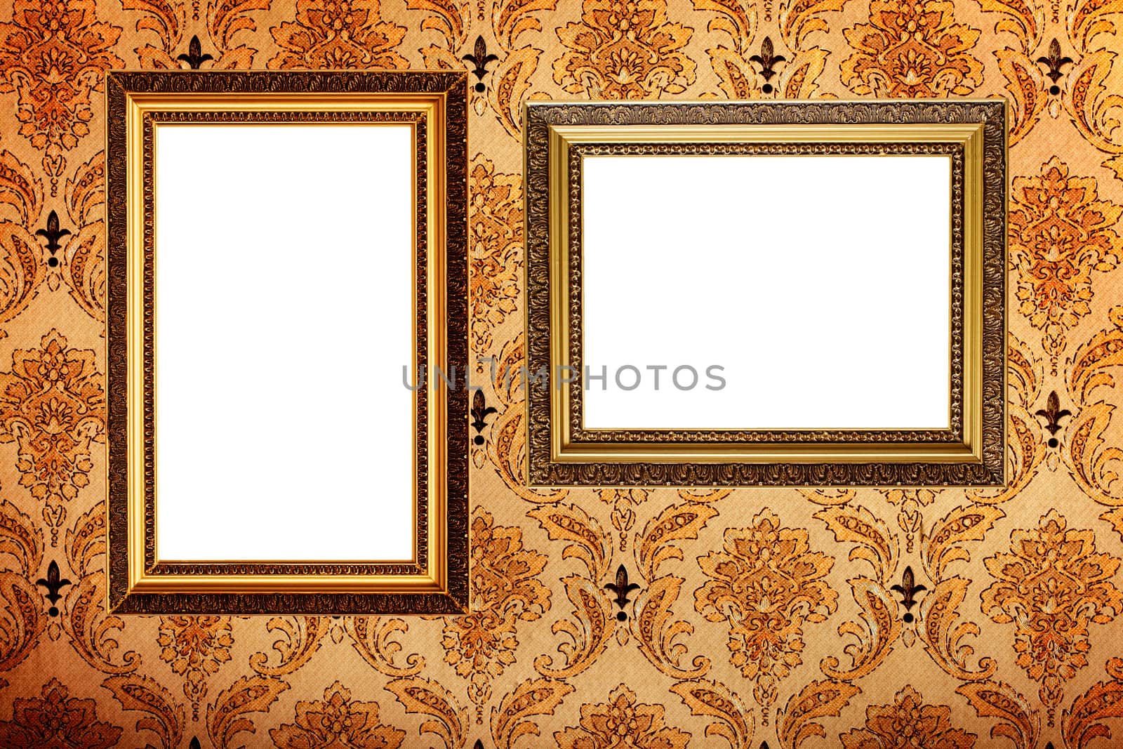 Vintage gold plated picture frames  on retro wallpaper background