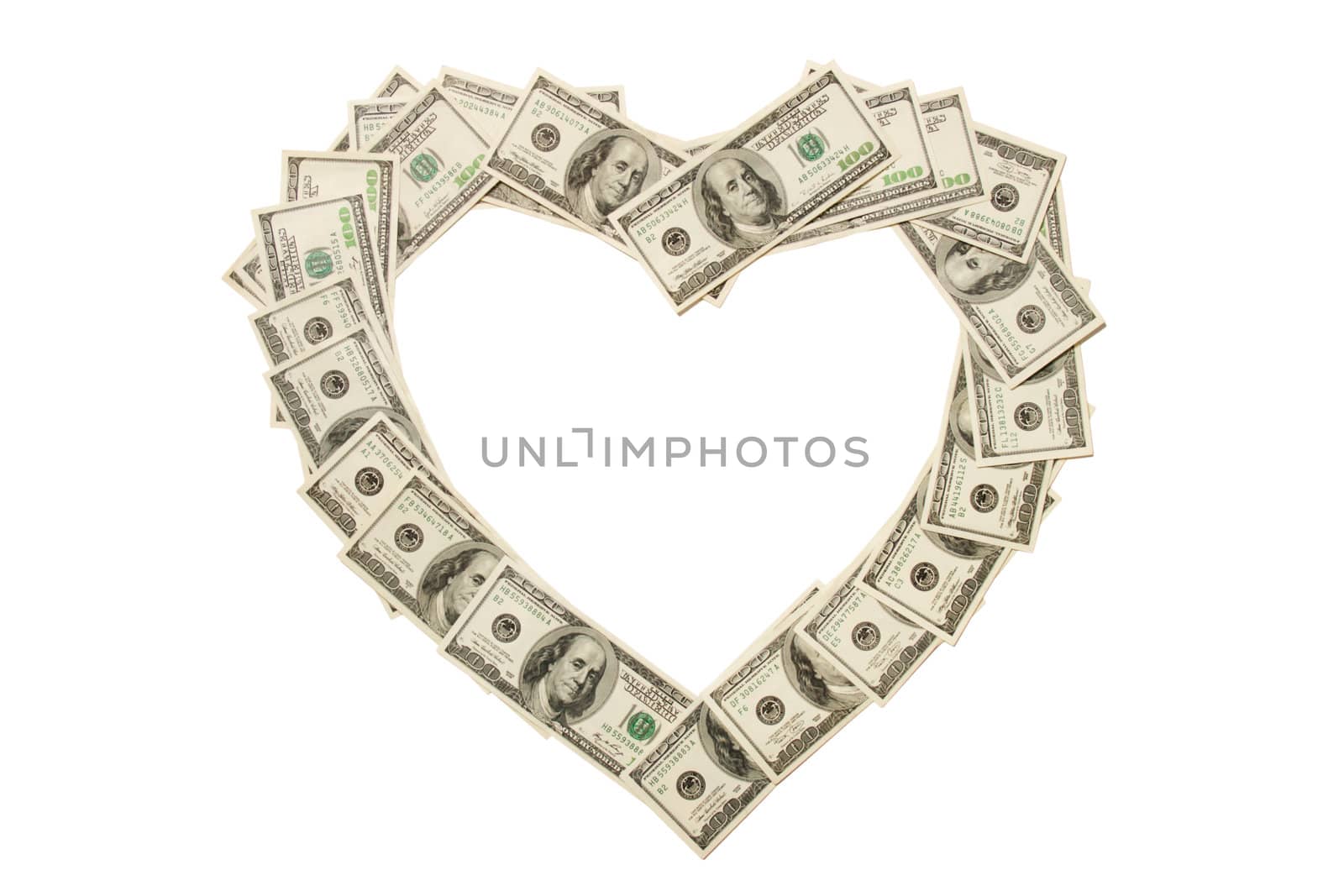 Heart made of hundred dollar banknotes isolated on white background