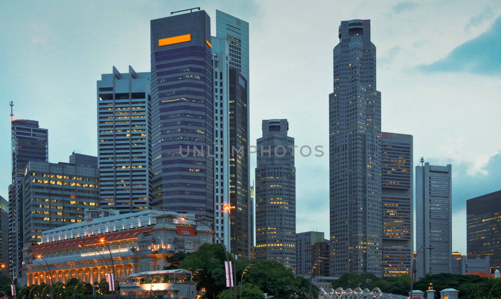 Singapore skyscrapers in evening by dimol