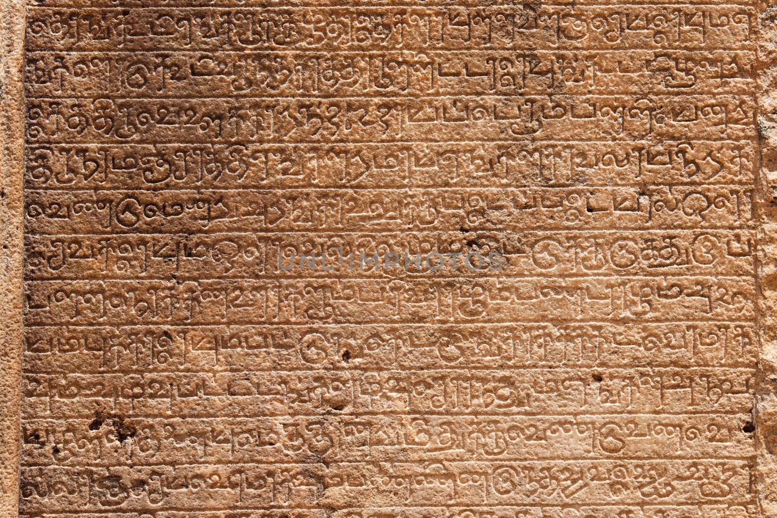 Ancient stone inscriptions in Singalese language texture. Pollonaruwa, Sri Lanka