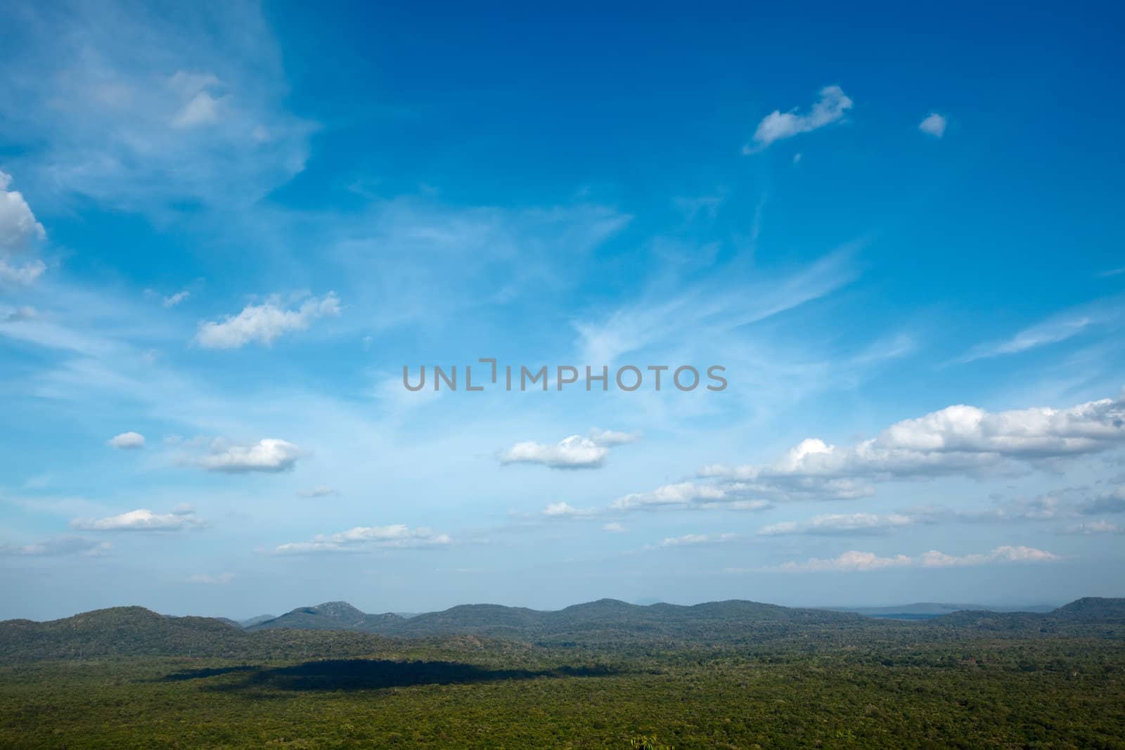 Sky above small mountains, covered with trees. Sri Lanka