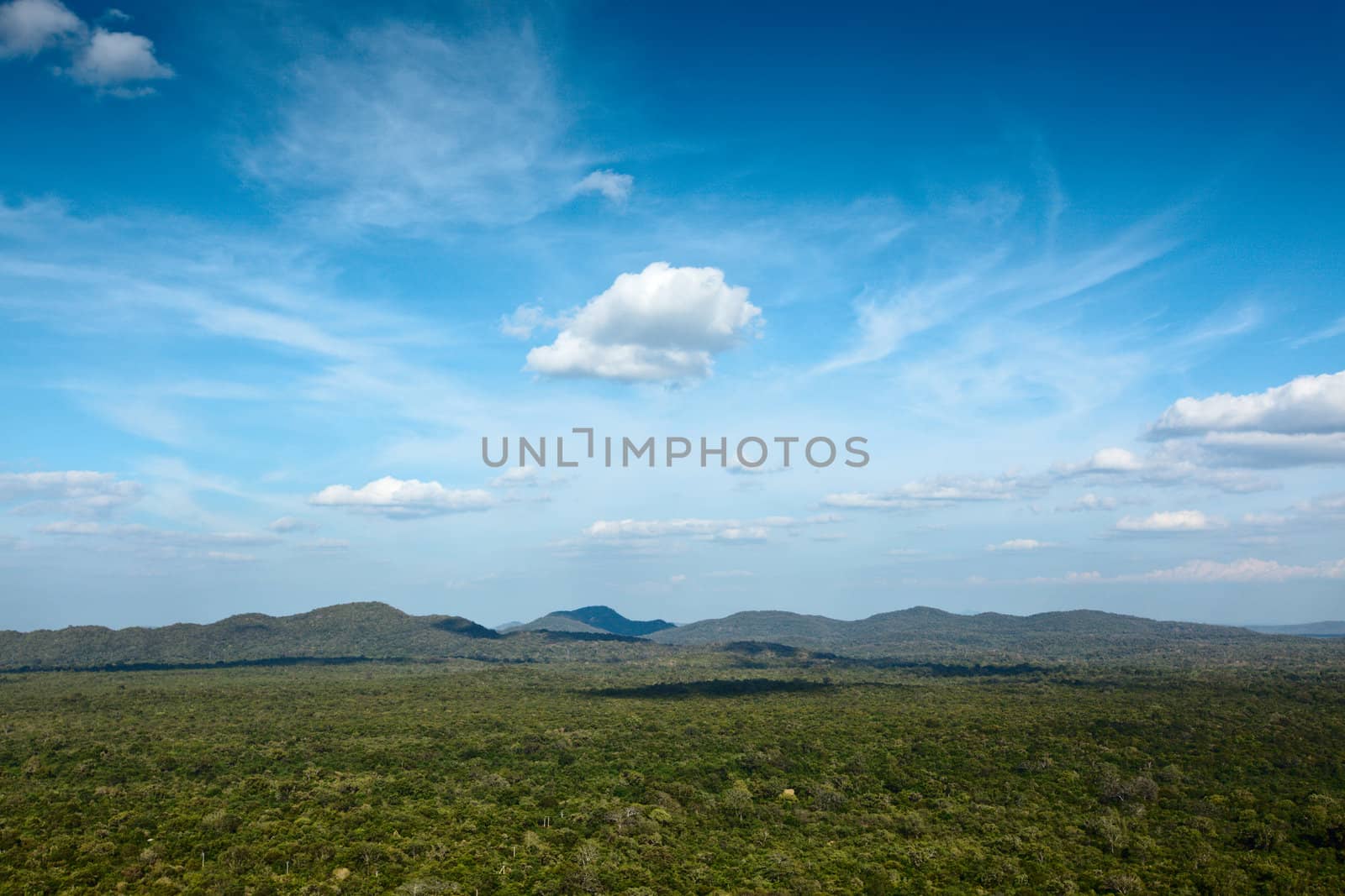 Sky above small mountains, covered with trees. Sri Lanka