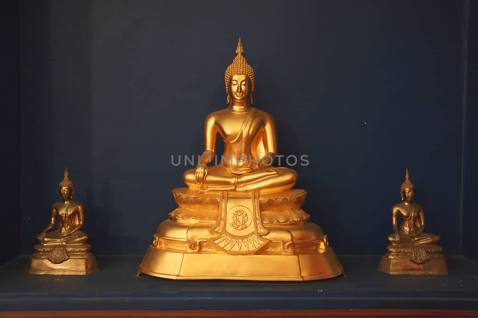 Buddha image on dark background photo. Thailand.