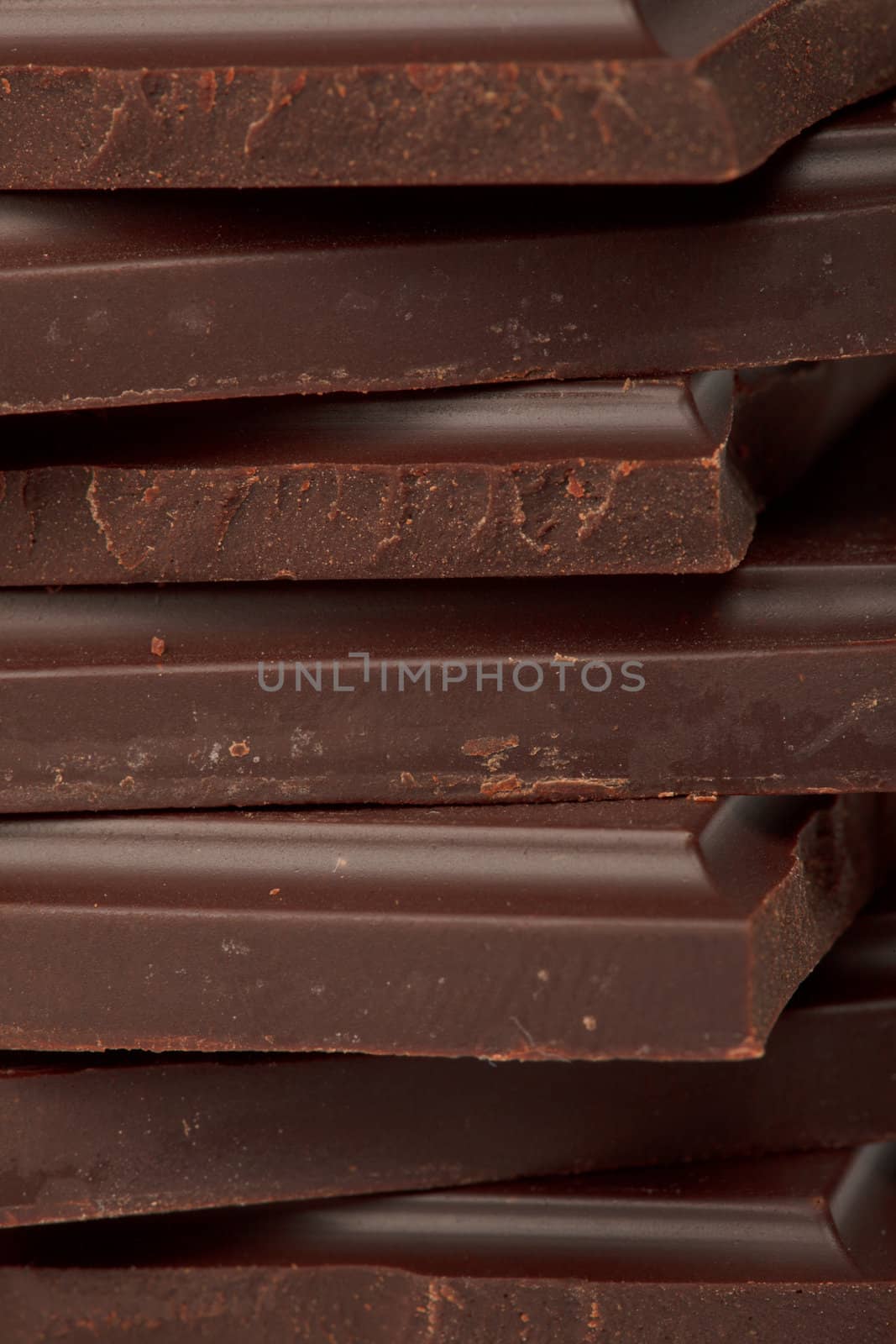 Stack of dark chocolate close up