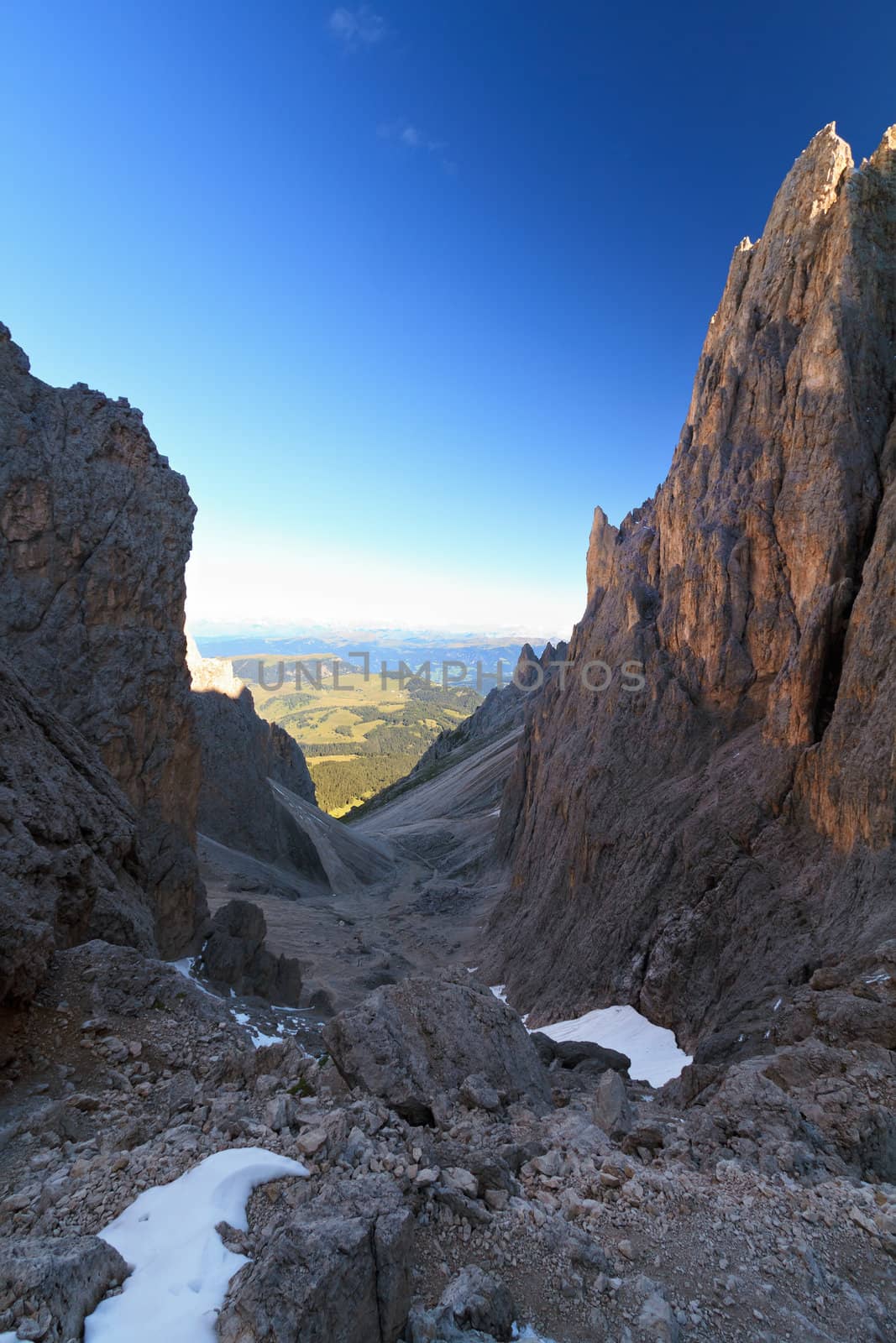 early morning on a gorge in Dolomites, Sassolungo mountain