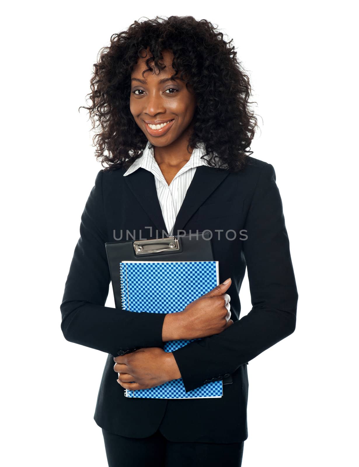 Smiling confident female executive posing with clipboard and official file