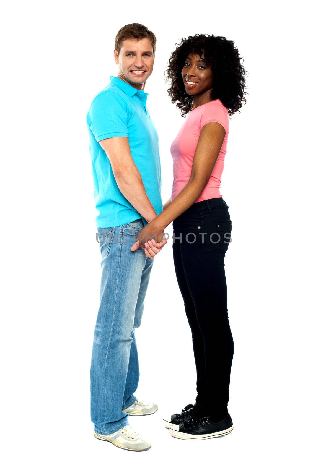African American couple in love. Holding hands full length shot