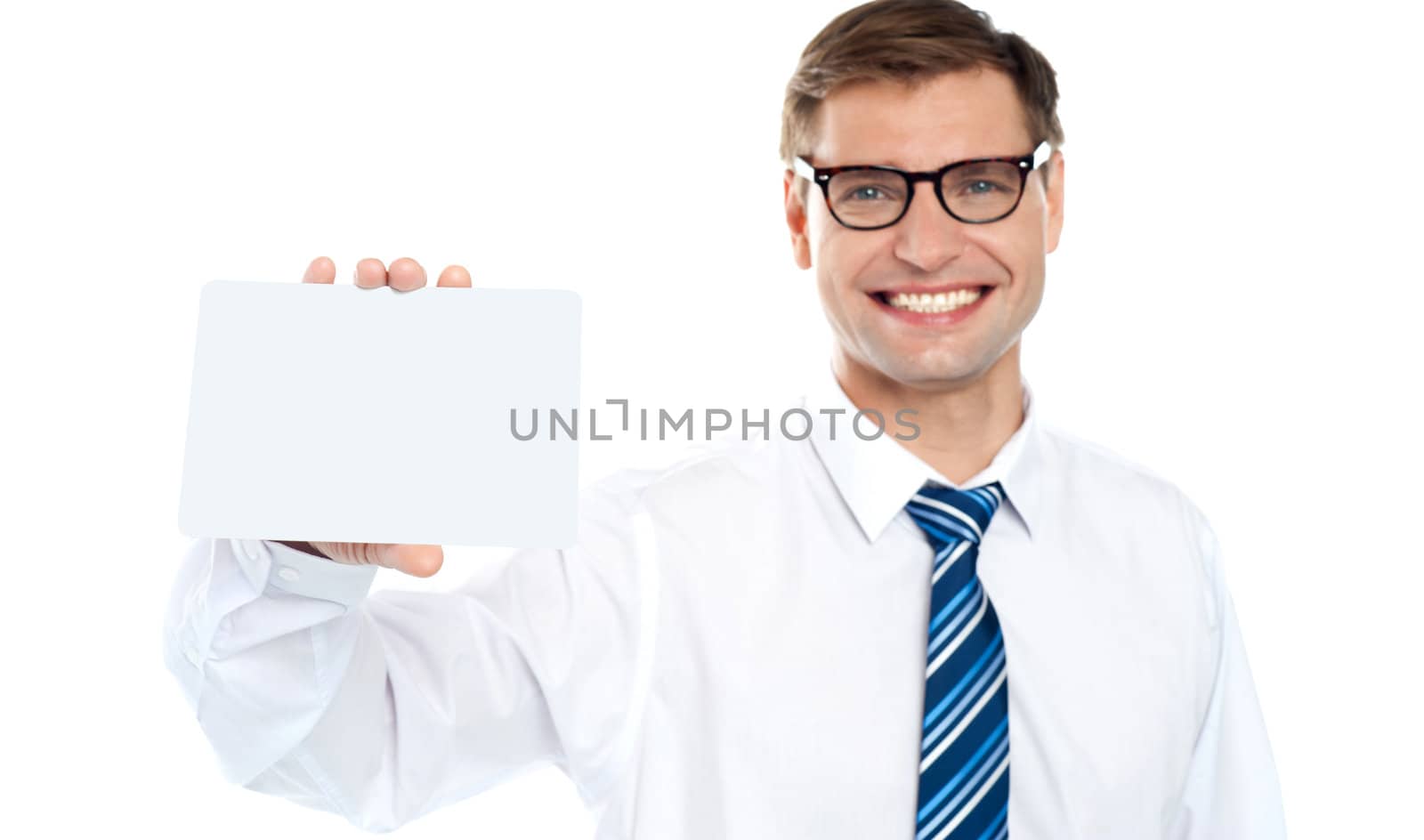 Handsome male showing blank business card. Isolated on white background