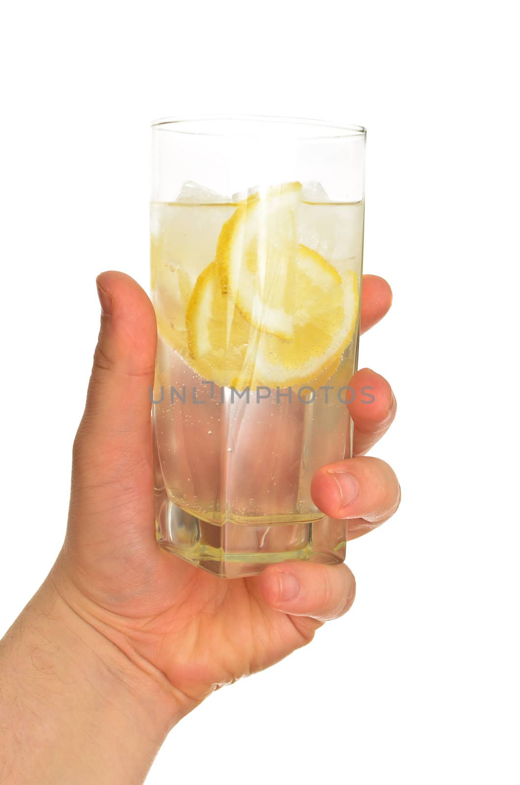 Man's hand holding glass of water with ice and lemon, isolated on white