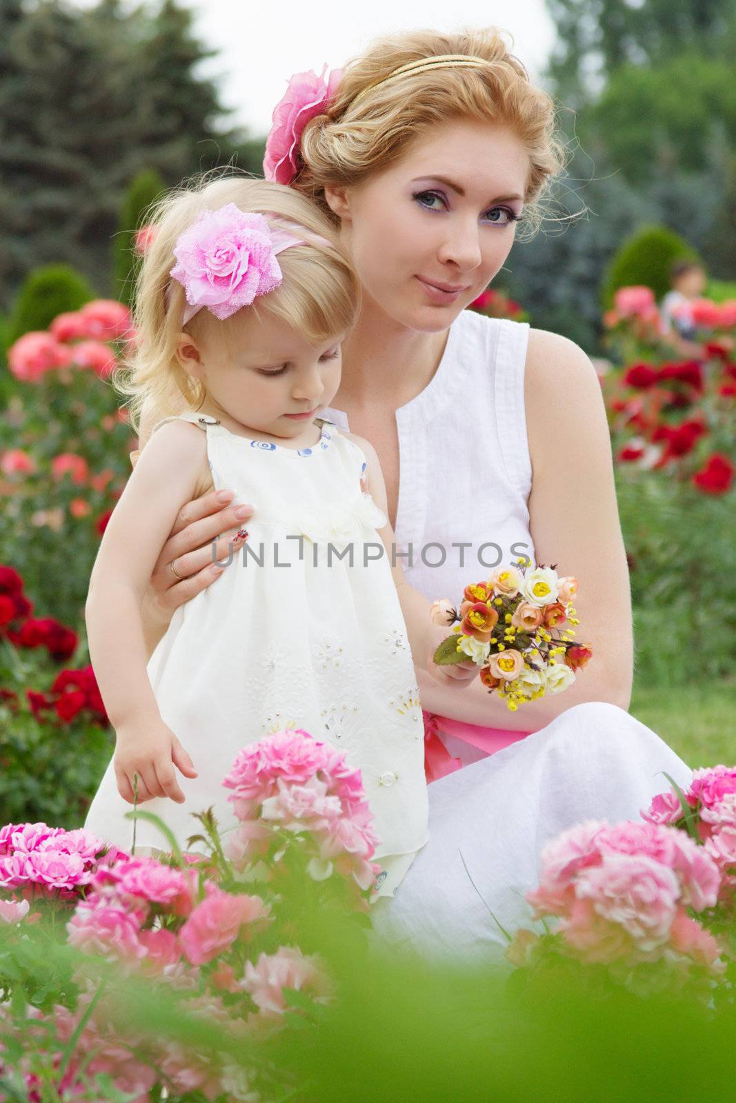 Mother and baby in rose garden by Angel_a