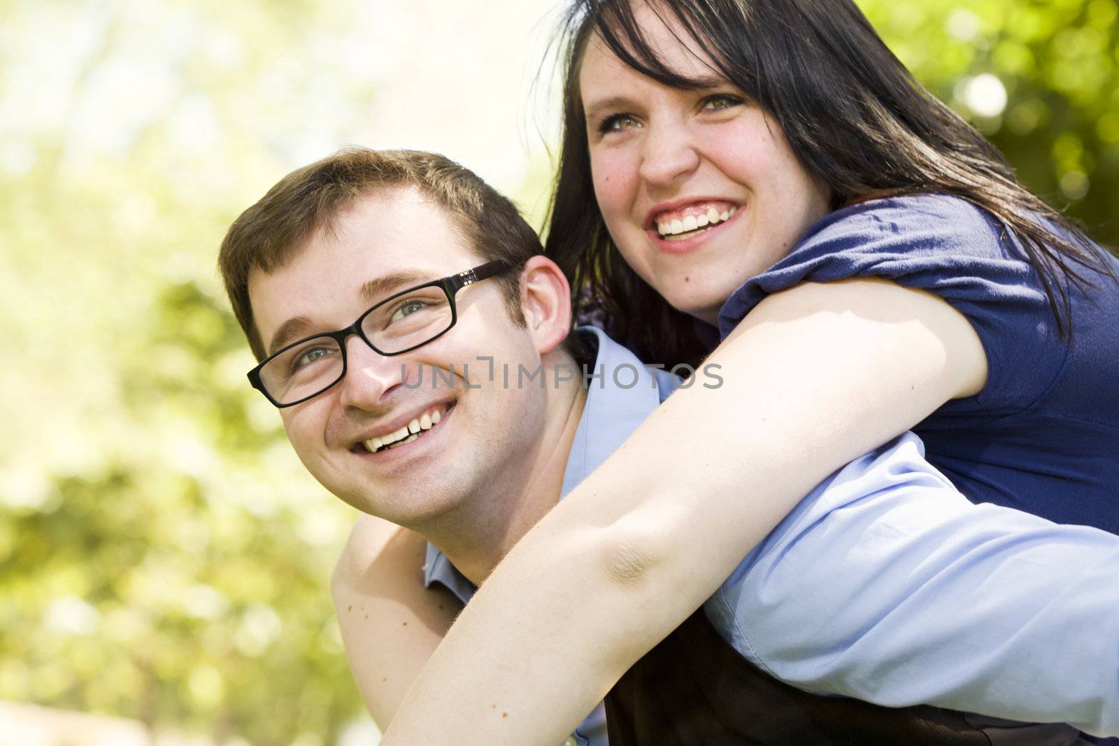 Attractive Young Couple Having Fun Outside in the Park